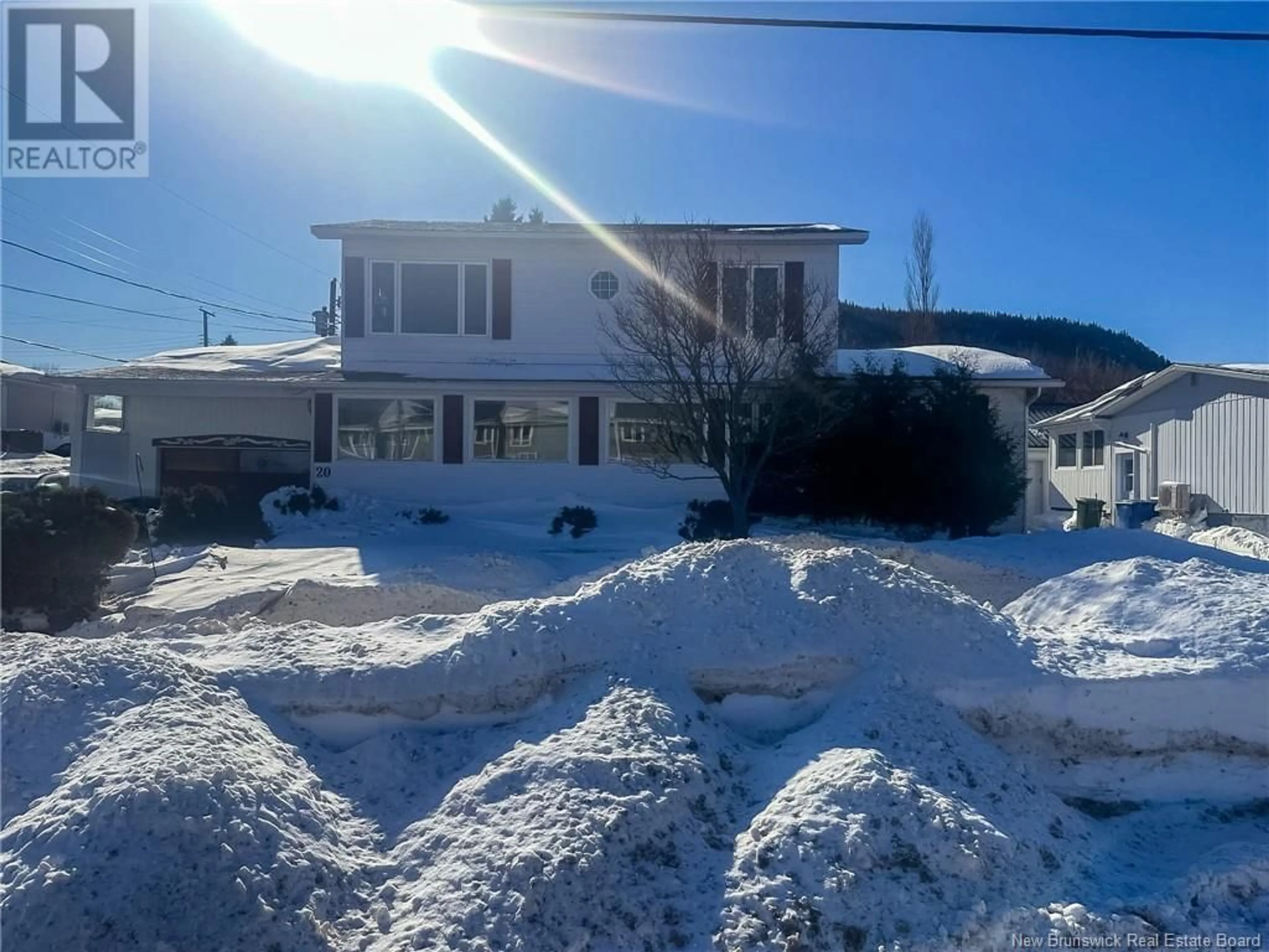 A pic from outside/outdoor area/front of a property/back of a property/a pic from drone, unknown for 20 Malcolm Avenue, Campbellton New Brunswick E3N3X1