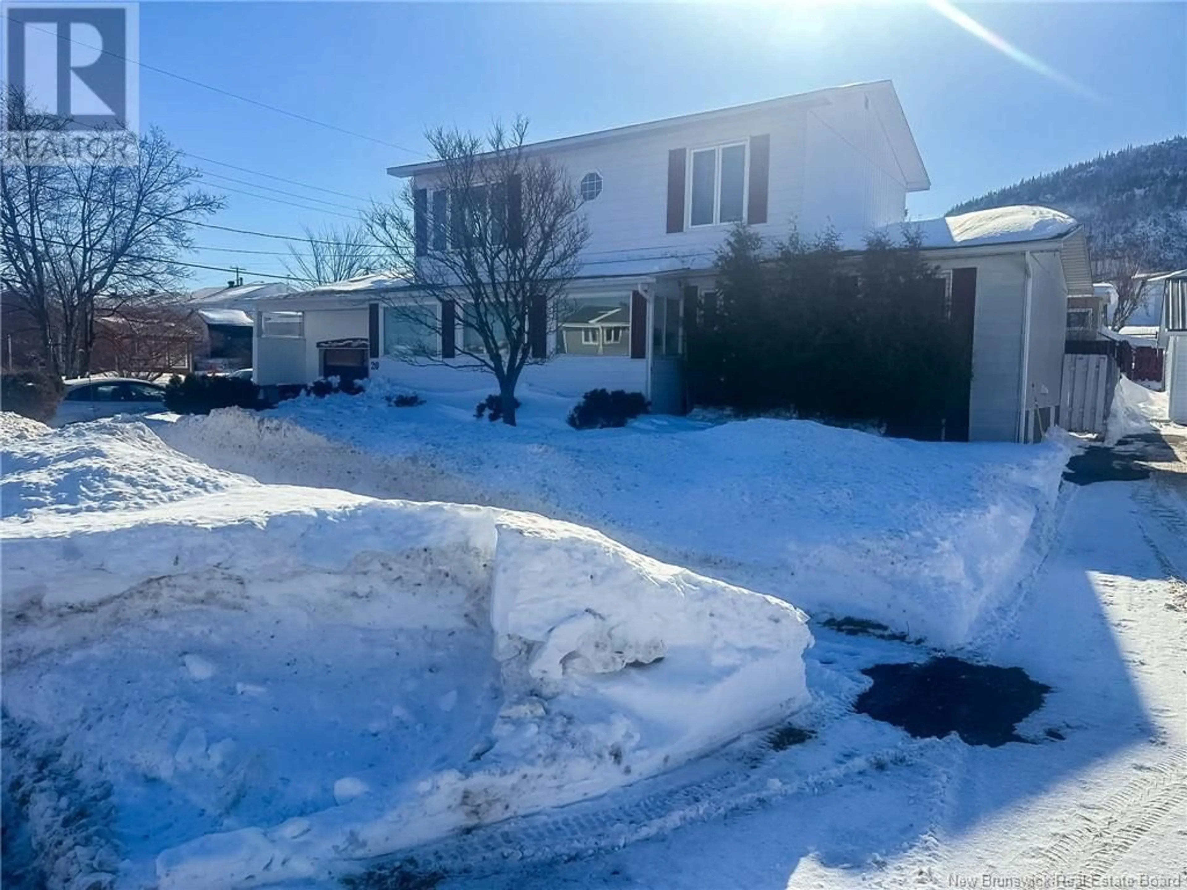 A pic from outside/outdoor area/front of a property/back of a property/a pic from drone, street for 20 Malcolm Avenue, Campbellton New Brunswick E3N3X1