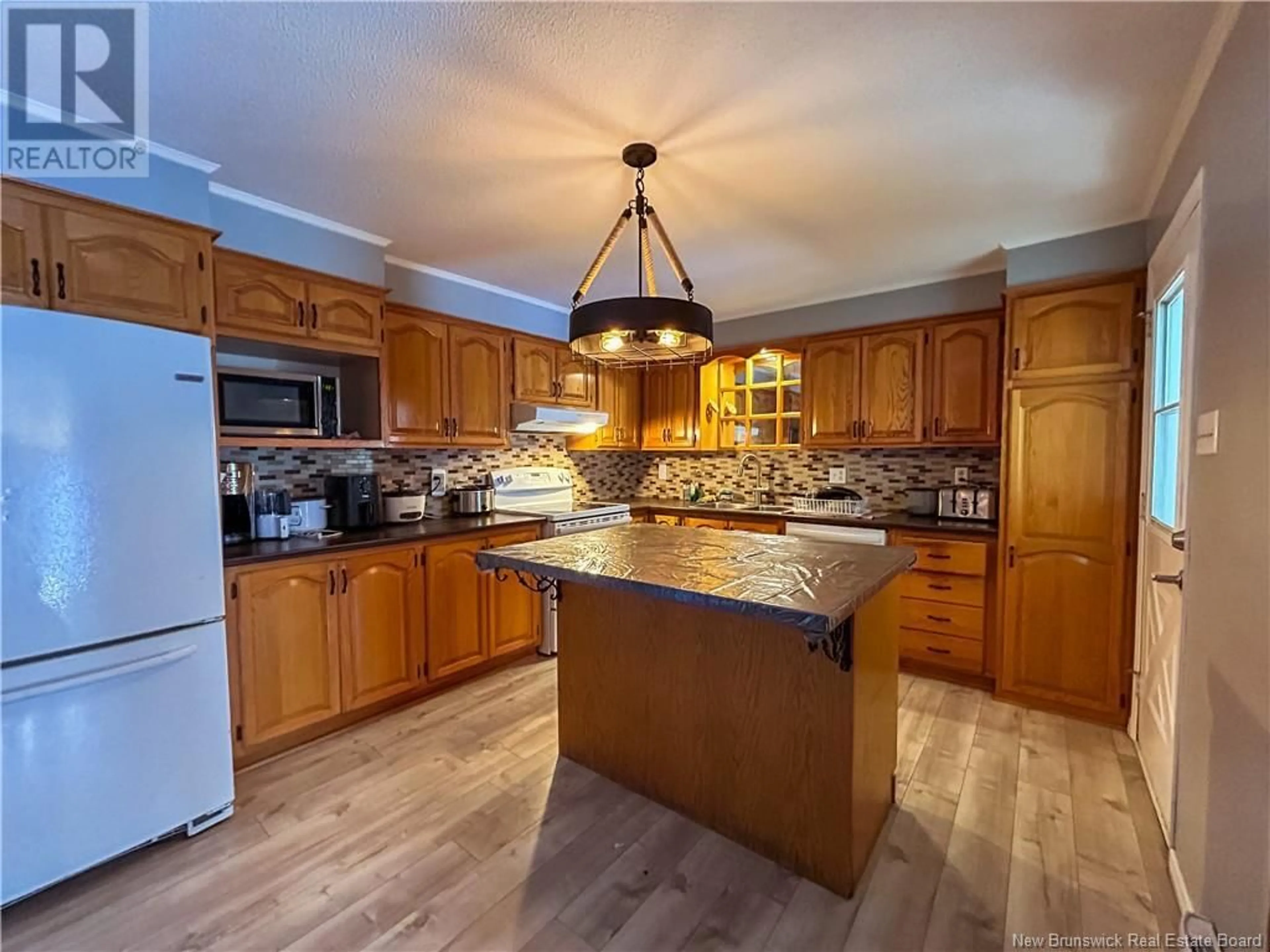 Open concept kitchen, unknown for 20 Malcolm Avenue, Campbellton New Brunswick E3N3X1