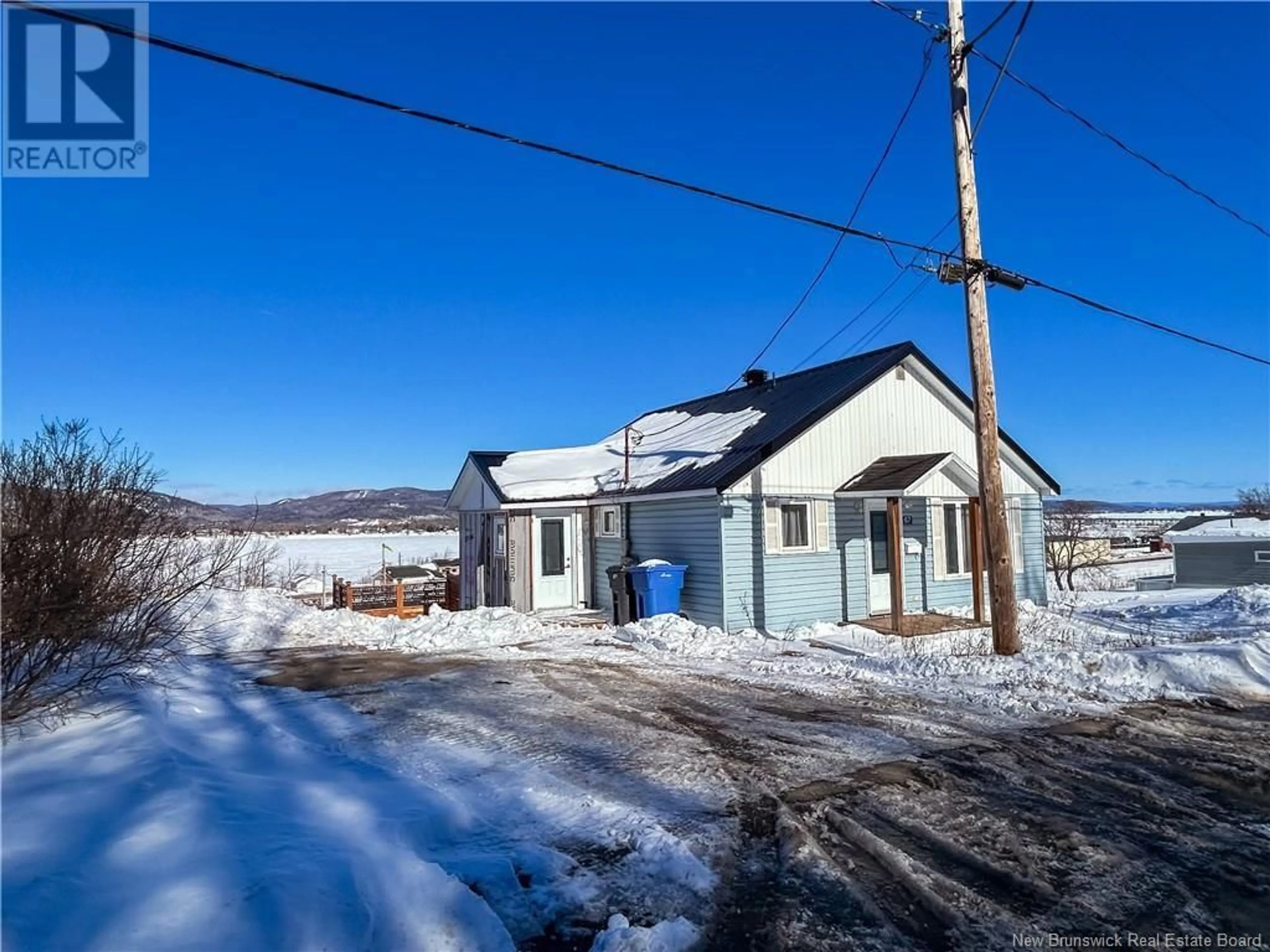 A pic from outside/outdoor area/front of a property/back of a property/a pic from drone, unknown for 67 HILLSIDE STREET, Campbellton New Brunswick E3N2G1