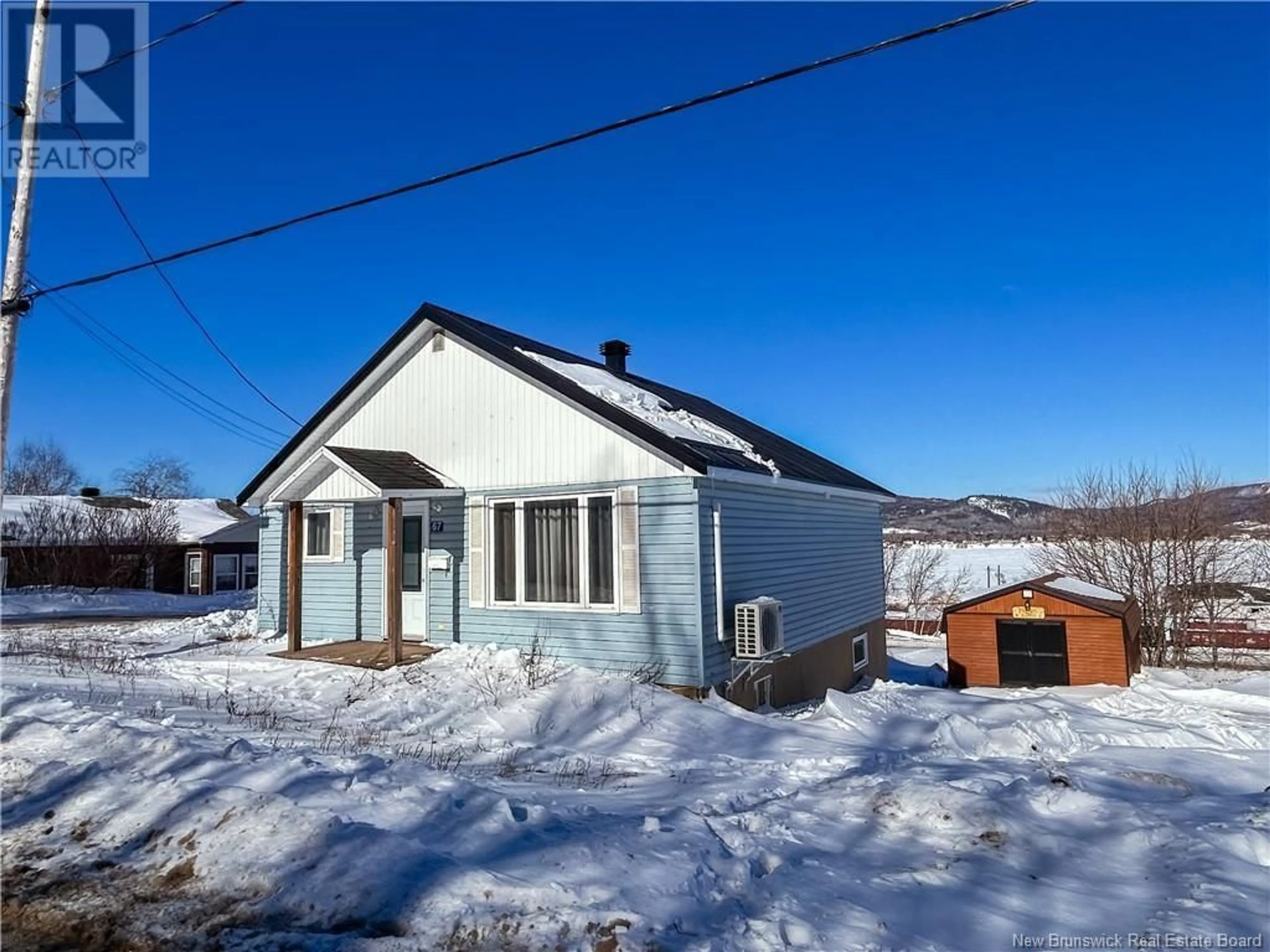 A pic from outside/outdoor area/front of a property/back of a property/a pic from drone, street for 67 Hillside Street, Campbellton New Brunswick E3N2G1