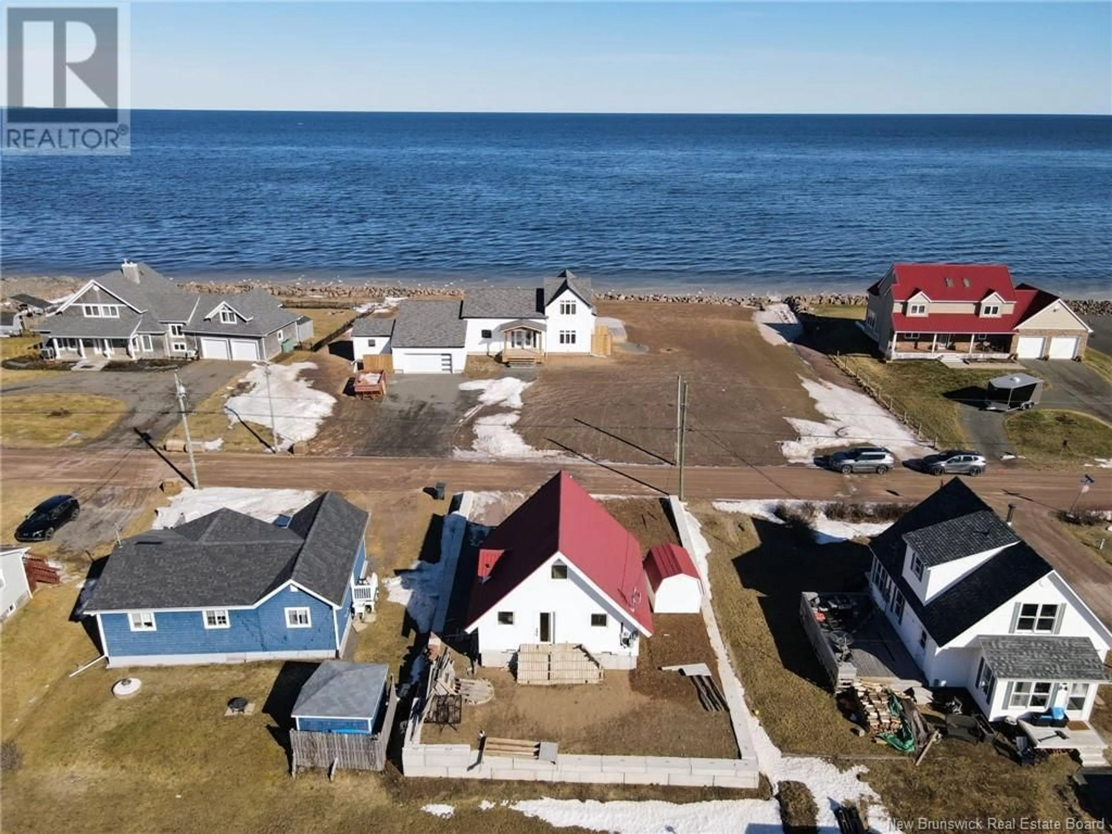 A pic from outside/outdoor area/front of a property/back of a property/a pic from drone, water/lake/river/ocean view for 11 SUR L' OCEAN STREET, Grand-Barachois New Brunswick E4P8N9