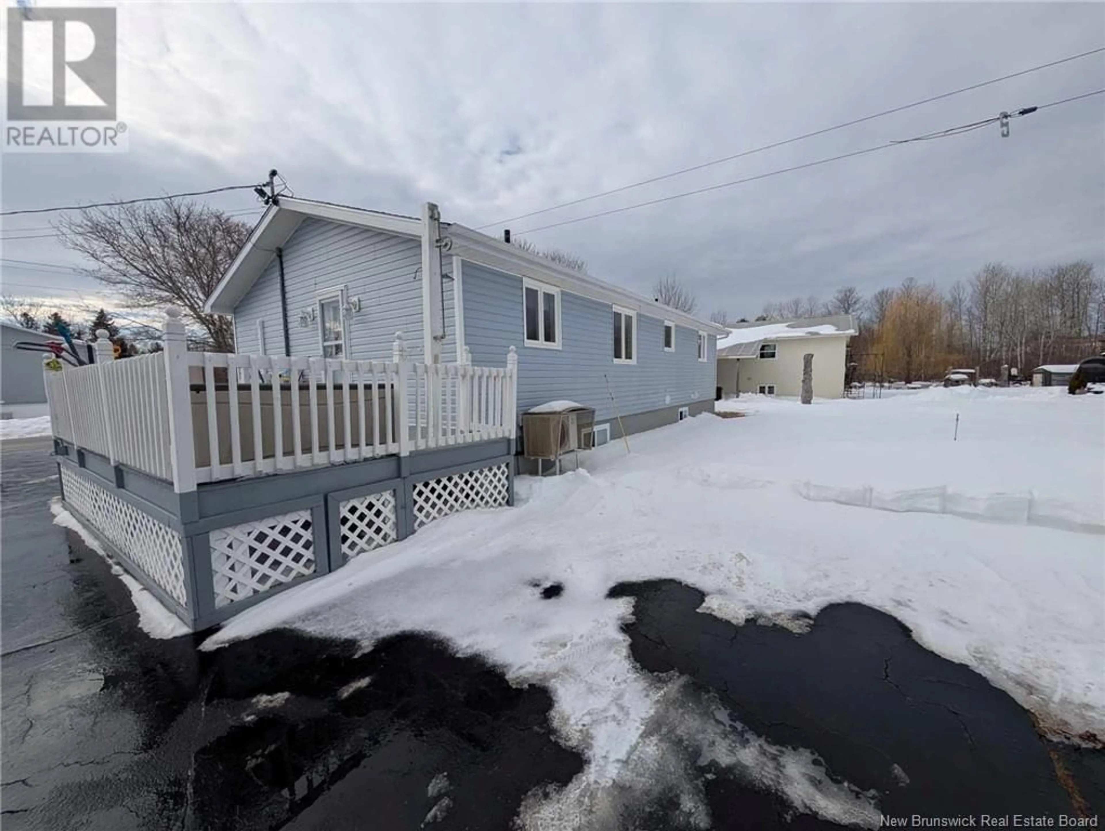 A pic from outside/outdoor area/front of a property/back of a property/a pic from drone, street for 692 St. Simon, Bathurst New Brunswick E2A3L9