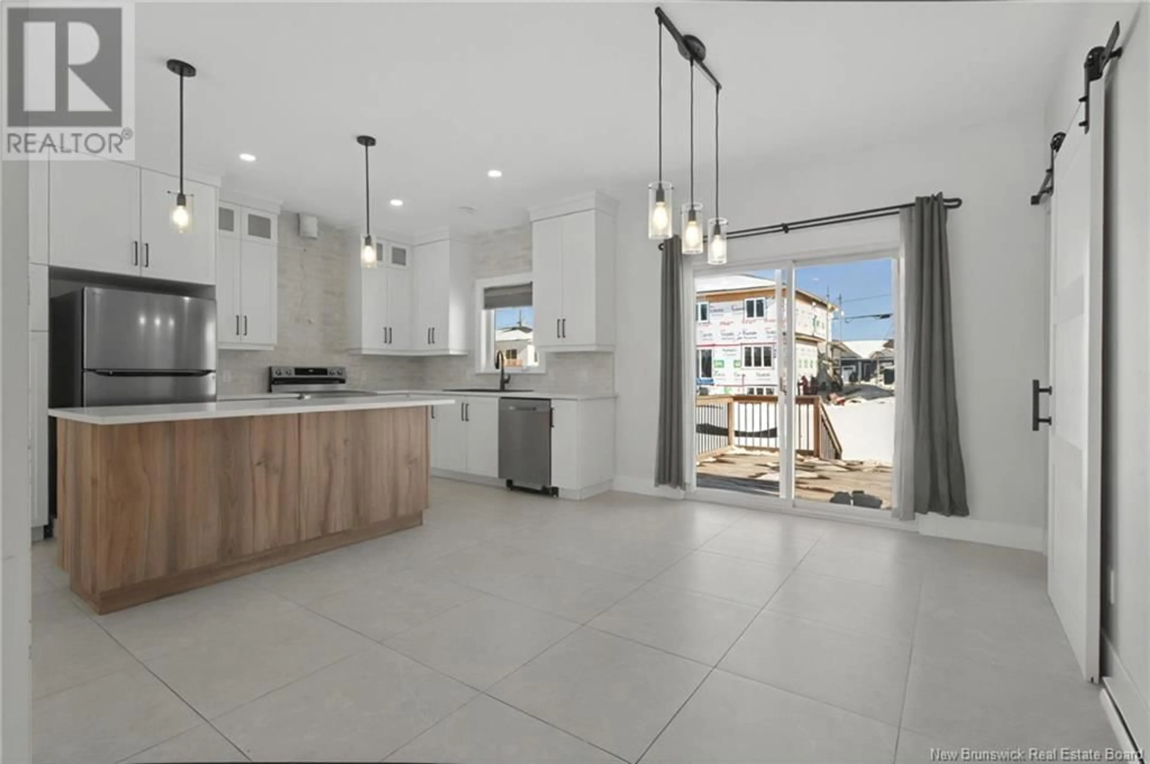 Open concept kitchen, ceramic/tile floor for 22 ROBERT, Shediac New Brunswick E4P0R2