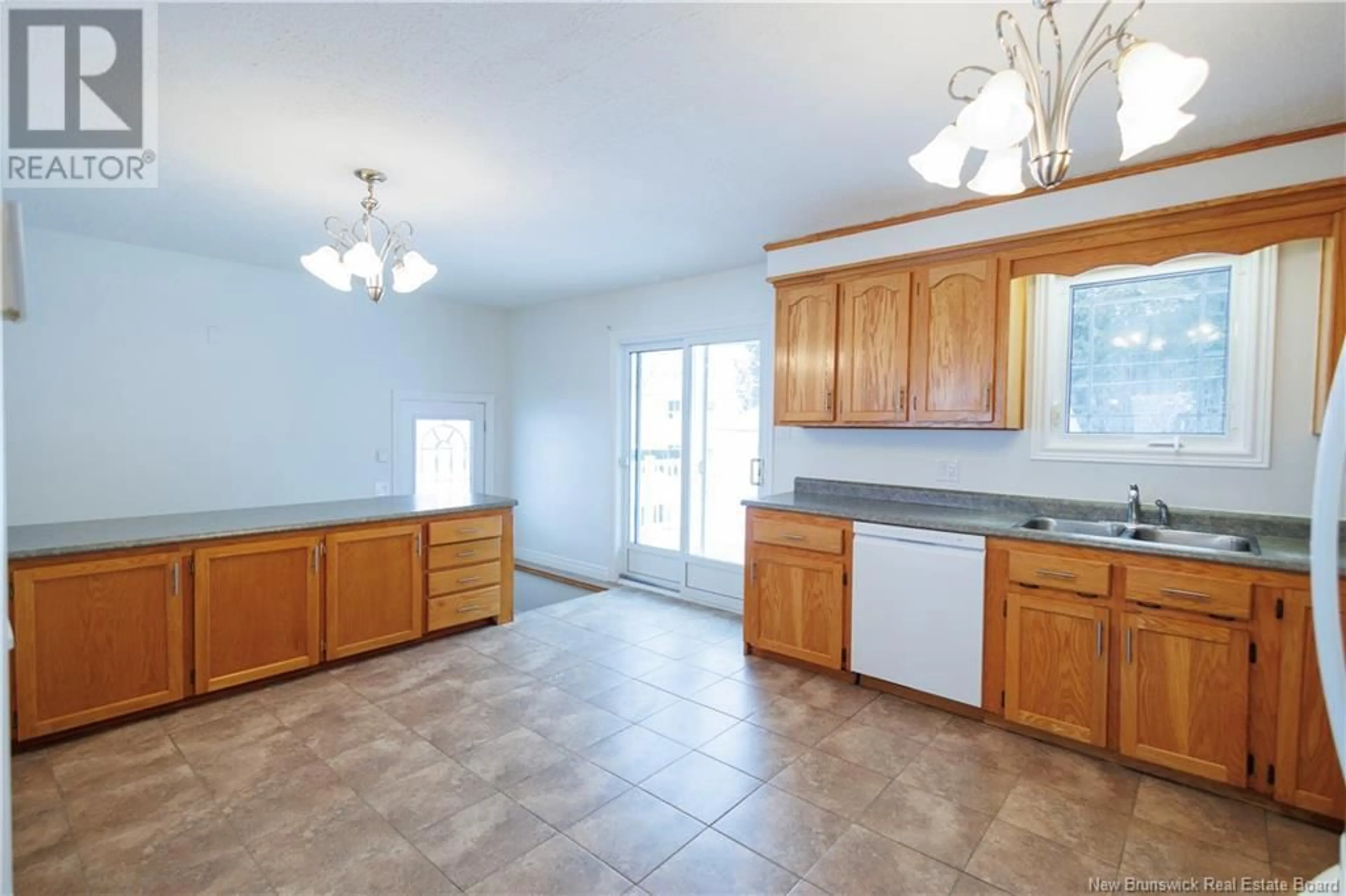 Open concept kitchen, ceramic/tile floor for 641 2nd Avenue, Grand-Sault/Grand Falls New Brunswick E3Z1A3