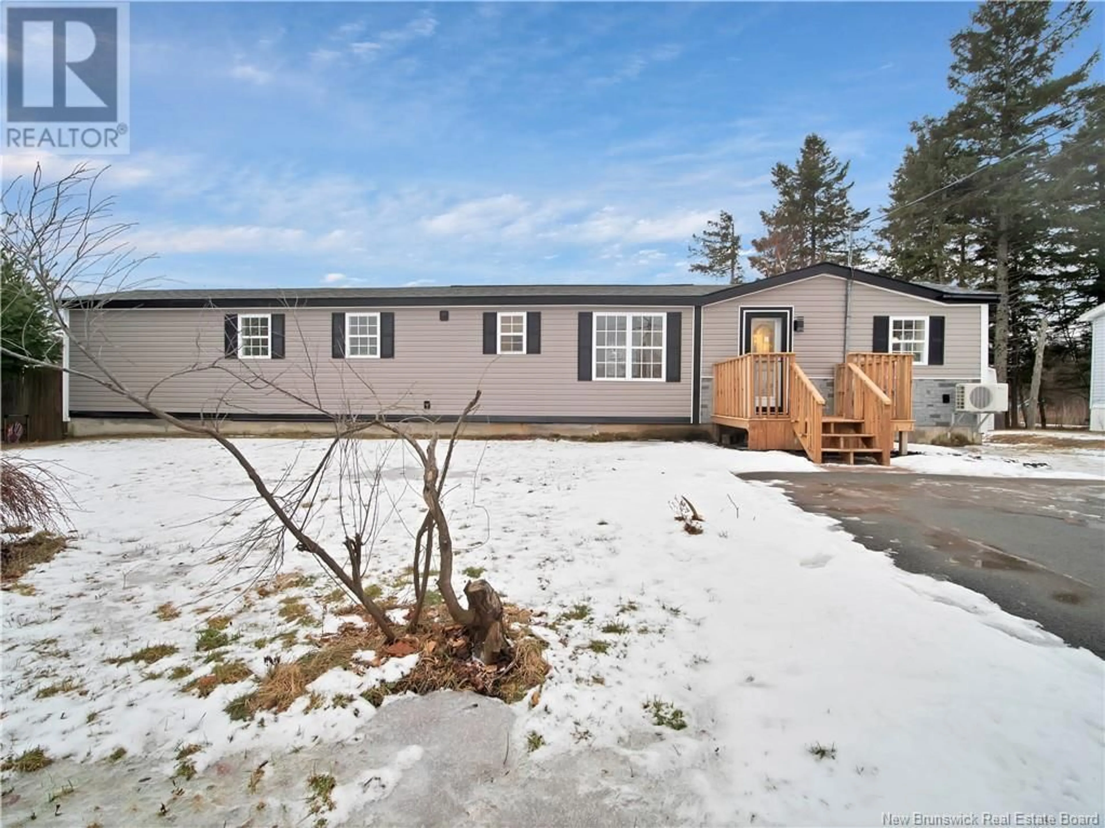 Home with vinyl exterior material, street for 12 Beauséjour Avenue, Bouctouche New Brunswick E4S2T7