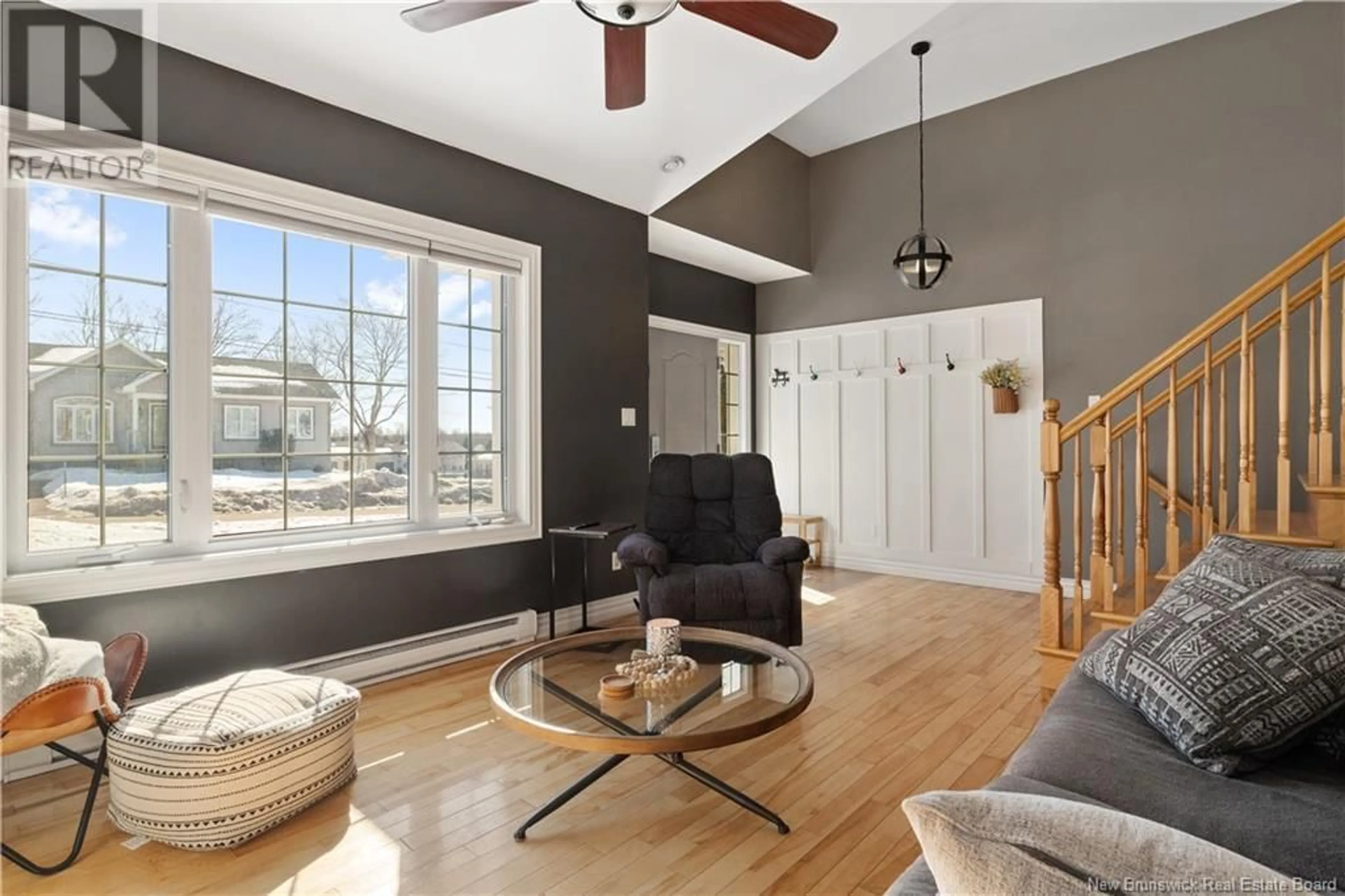 Living room with furniture, wood/laminate floor for 113 Herman, Dieppe New Brunswick E1A0L4