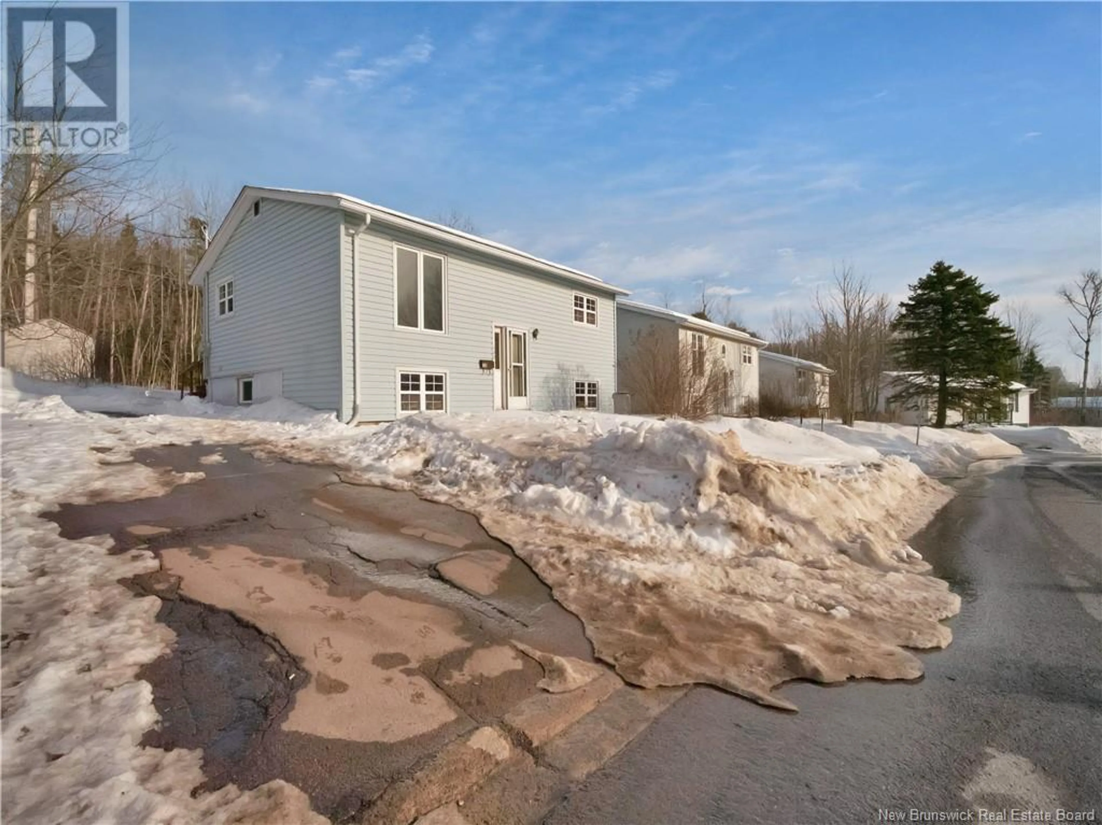 A pic from outside/outdoor area/front of a property/back of a property/a pic from drone, unknown for 338 WestBrook Circle, Moncton New Brunswick E1E2M2