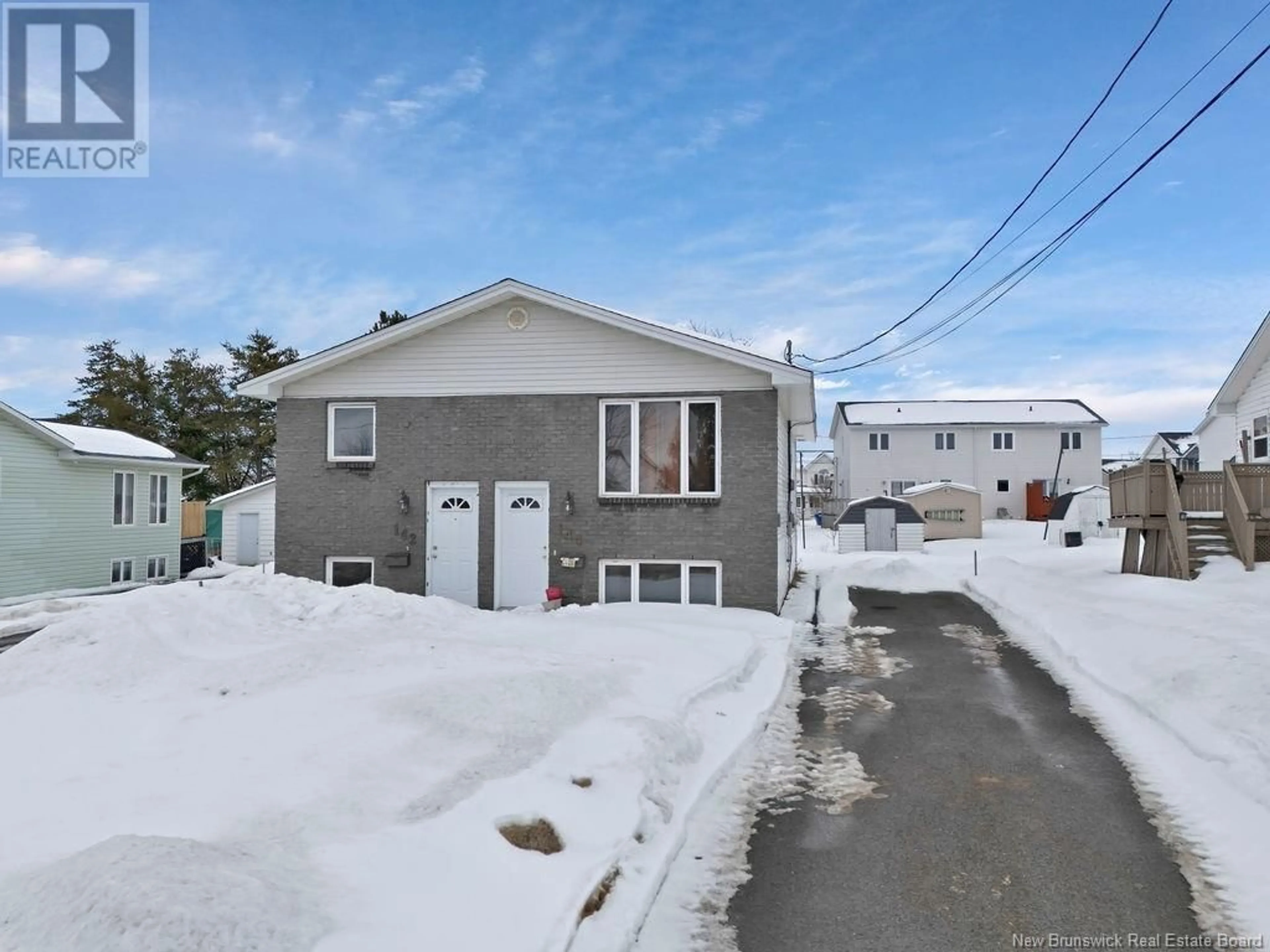 A pic from outside/outdoor area/front of a property/back of a property/a pic from drone, street for 142-144 Logan Lane, Moncton New Brunswick E1G1N5