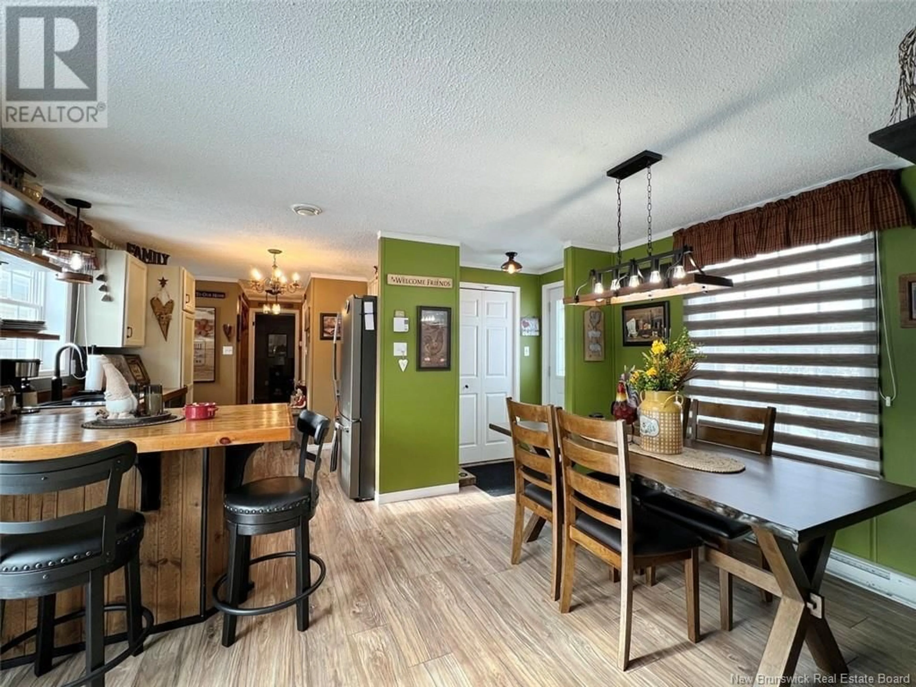 Dining room, wood/laminate floor for 1 Frederick Street, Saint-Jacques New Brunswick E7B2Z4