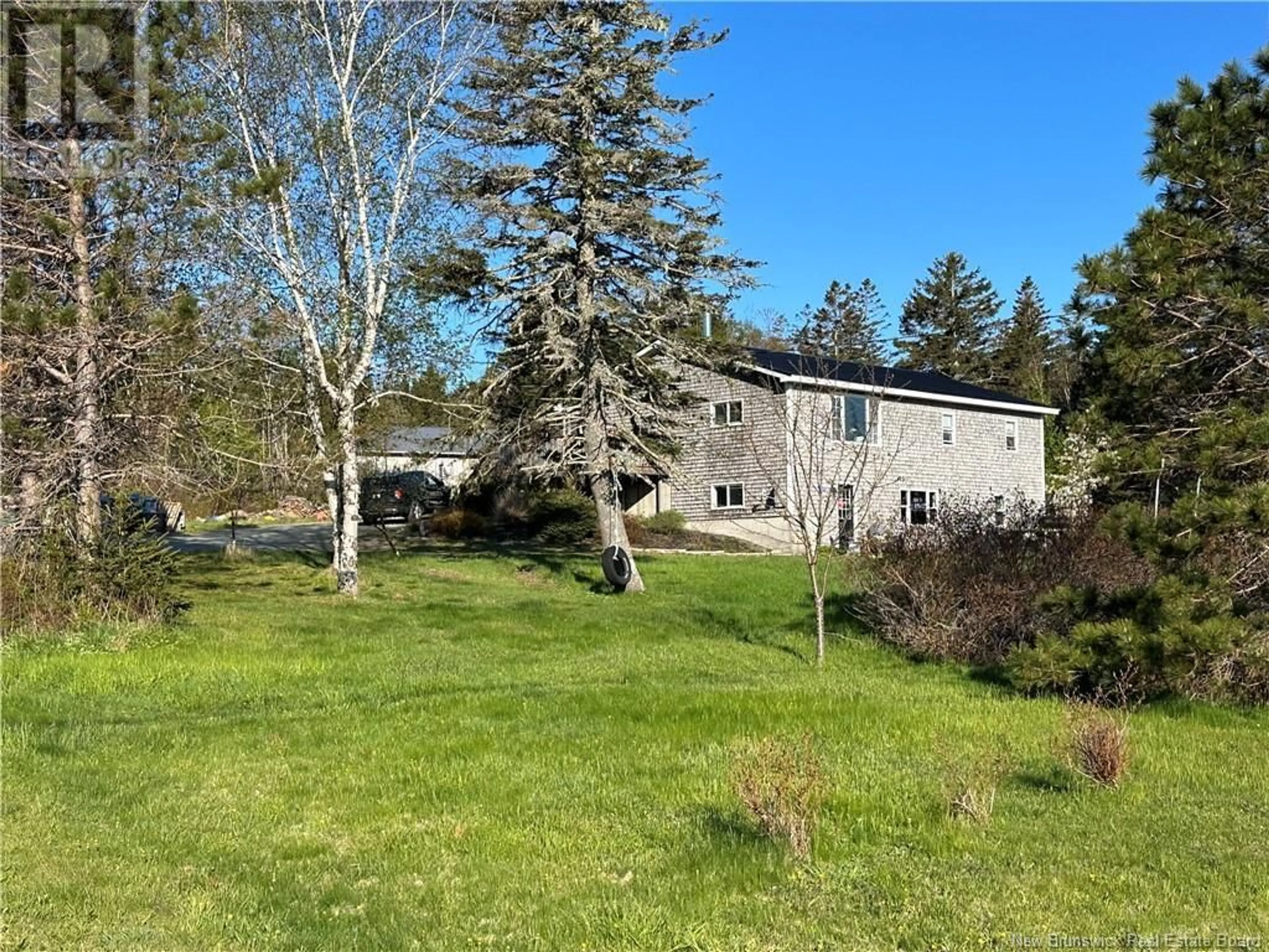 A pic from outside/outdoor area/front of a property/back of a property/a pic from drone, unknown for 239 Whistle Road, Grand Manan New Brunswick E5G1B4