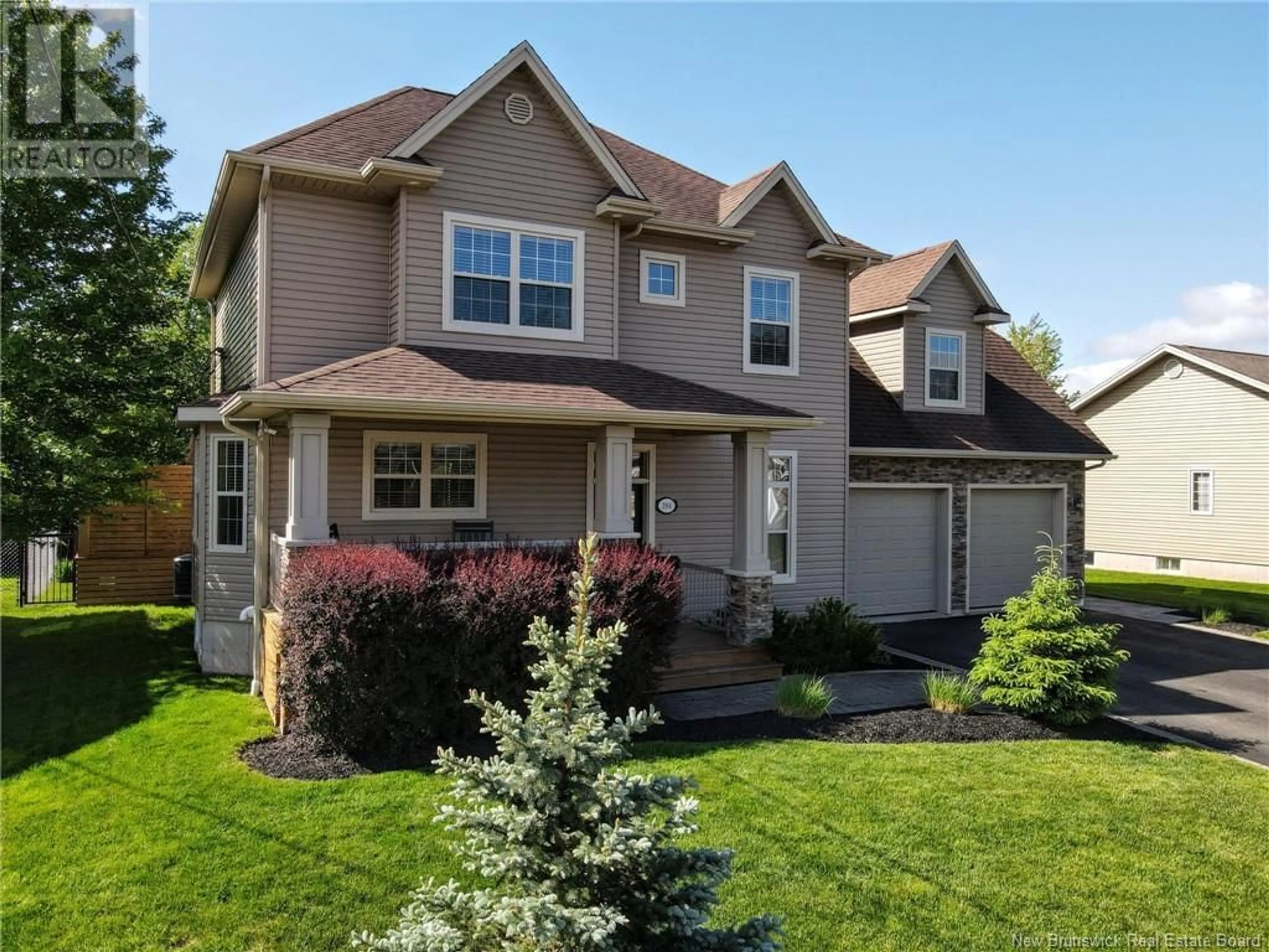 Home with vinyl exterior material, street for 394 BELLIVEAU STREET, Dieppe New Brunswick E1A6W6