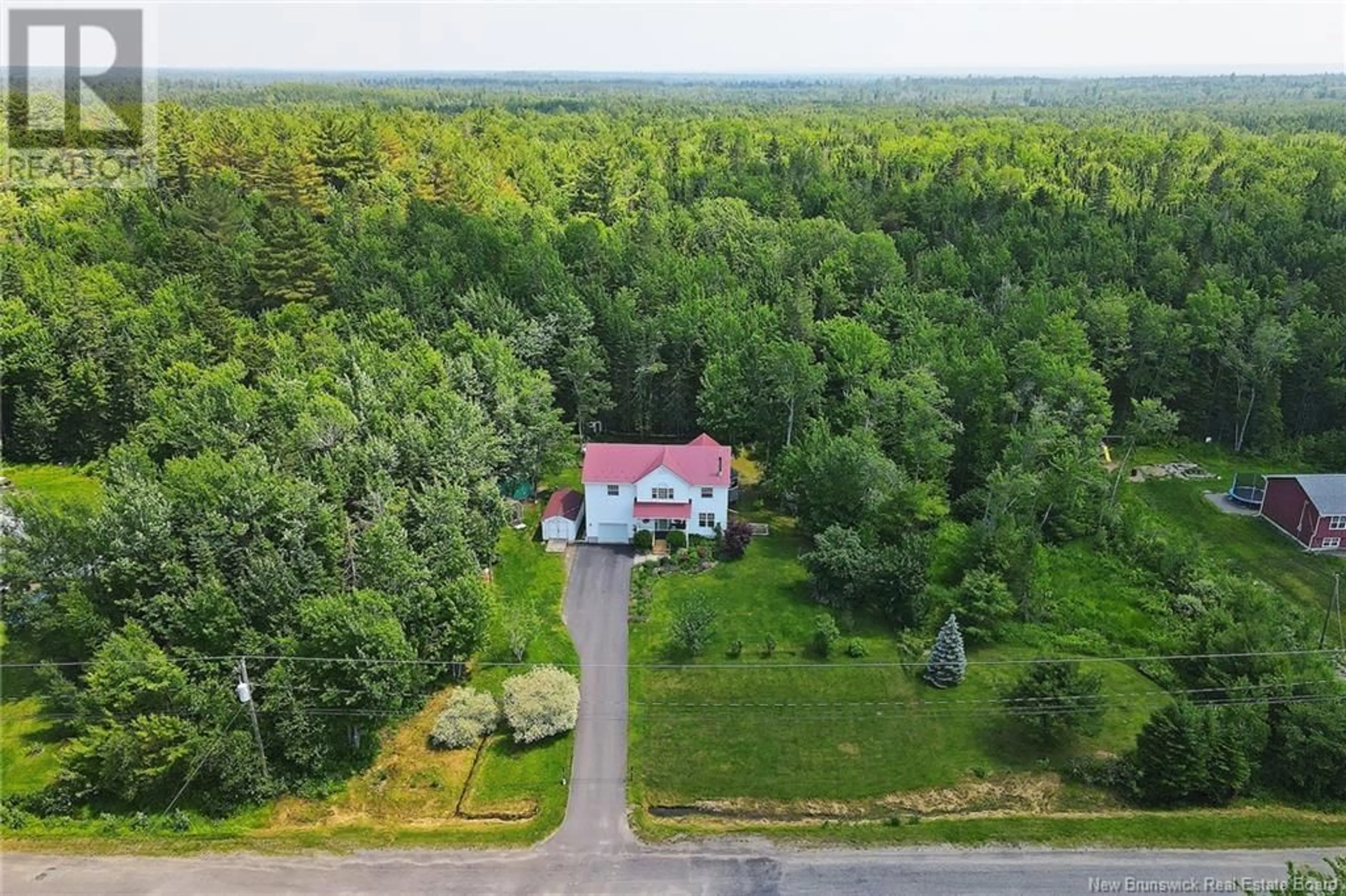 A pic from outside/outdoor area/front of a property/back of a property/a pic from drone, forest/trees view for 55 Brookwood Drive, Noonan New Brunswick E3A6Y7