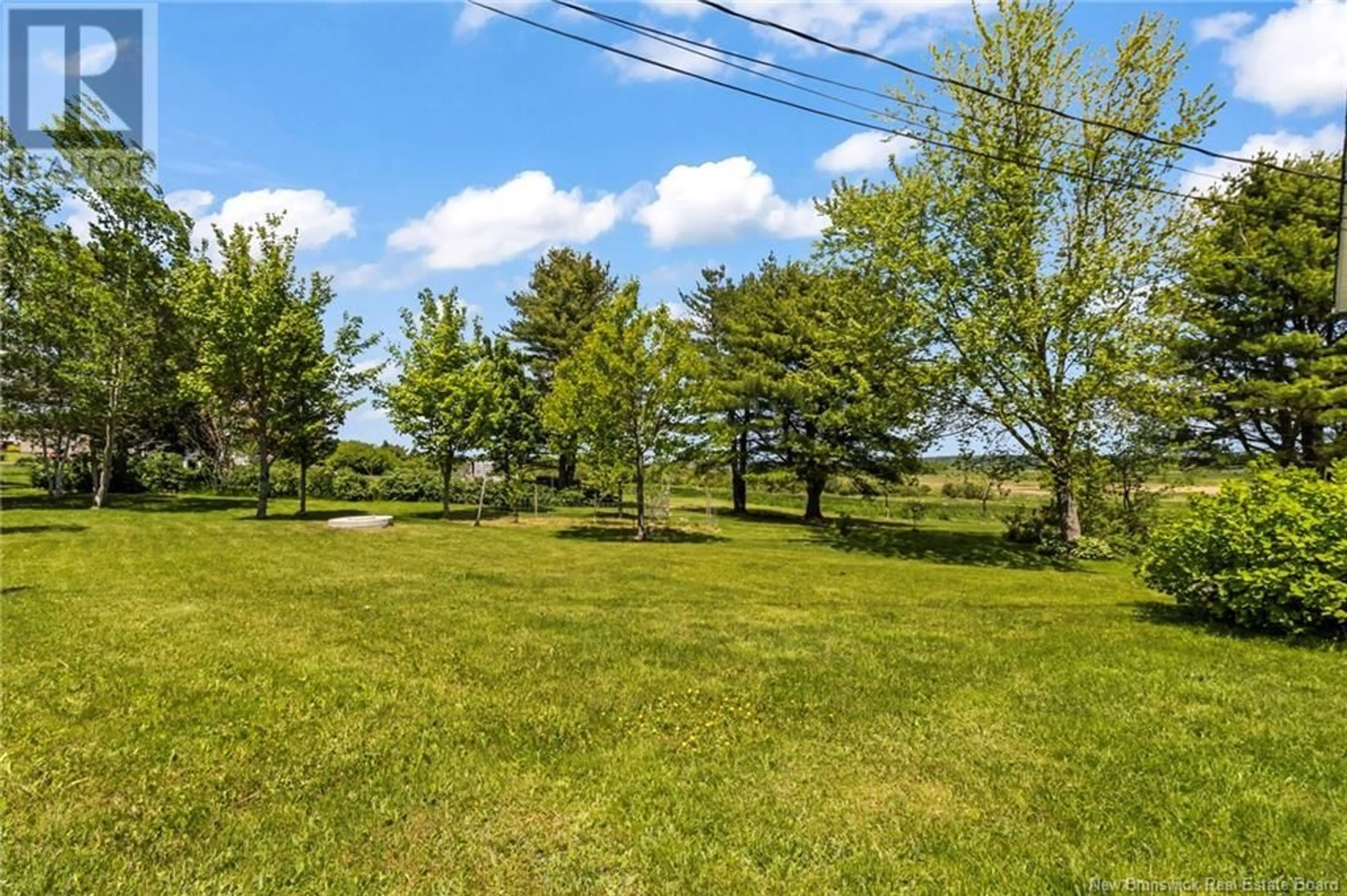 A pic from outside/outdoor area/front of a property/back of a property/a pic from drone, water/lake/river/ocean view for 1119 Centrale, Memramcook New Brunswick E4K3R9