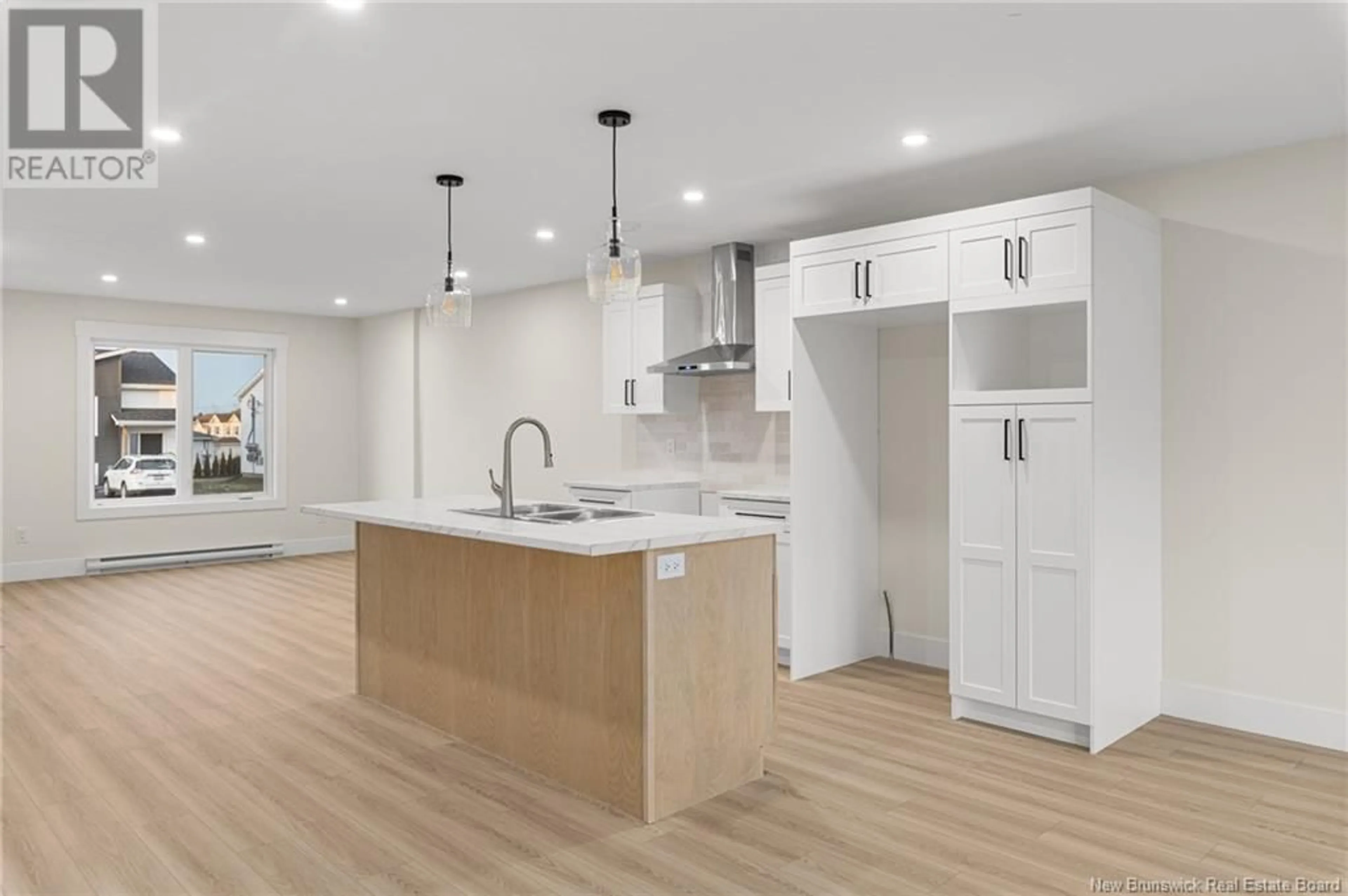 Open concept kitchen, unknown for 148 Ernest Street, Dieppe New Brunswick E1A8R4