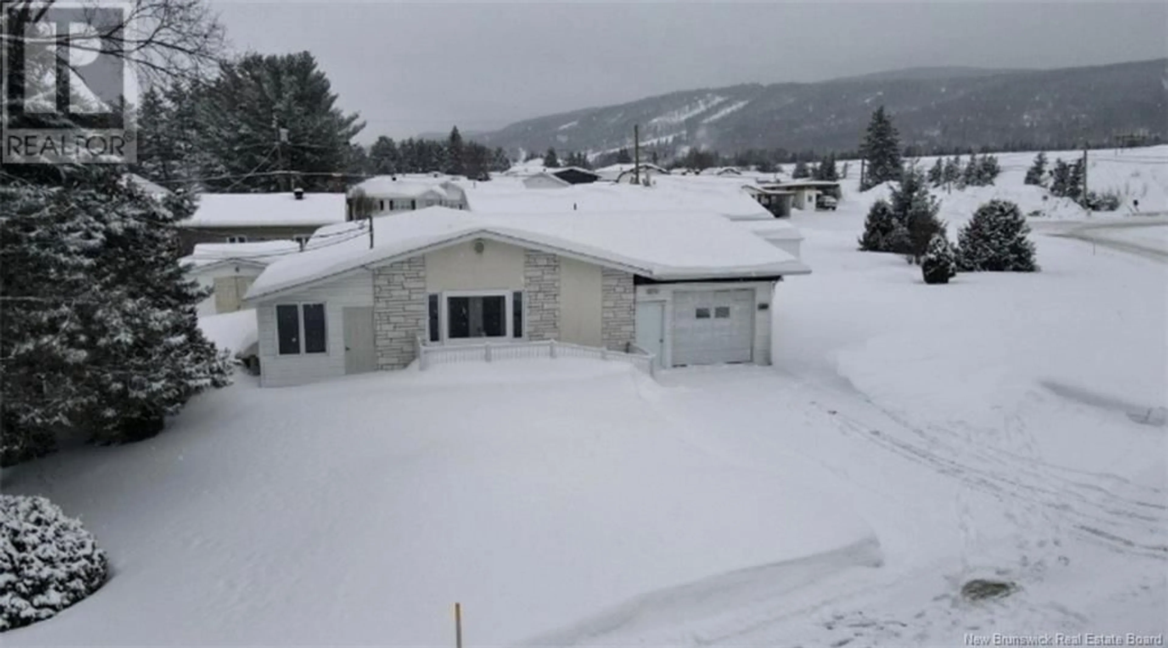 A pic from outside/outdoor area/front of a property/back of a property/a pic from drone, mountain view for 67 Grondin Street, Saint-Jacques New Brunswick E7B1J7