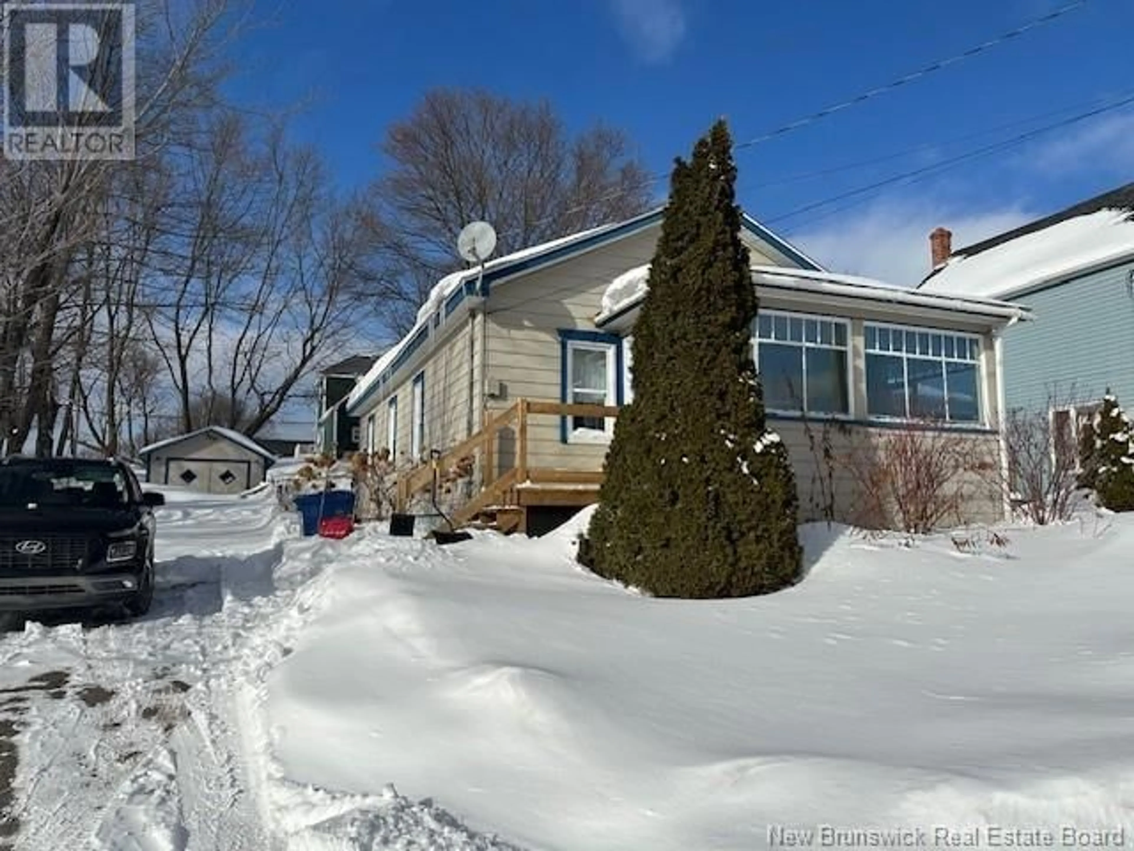 A pic from outside/outdoor area/front of a property/back of a property/a pic from drone, street for 11 Park Street, Campbellton New Brunswick E3N1N2