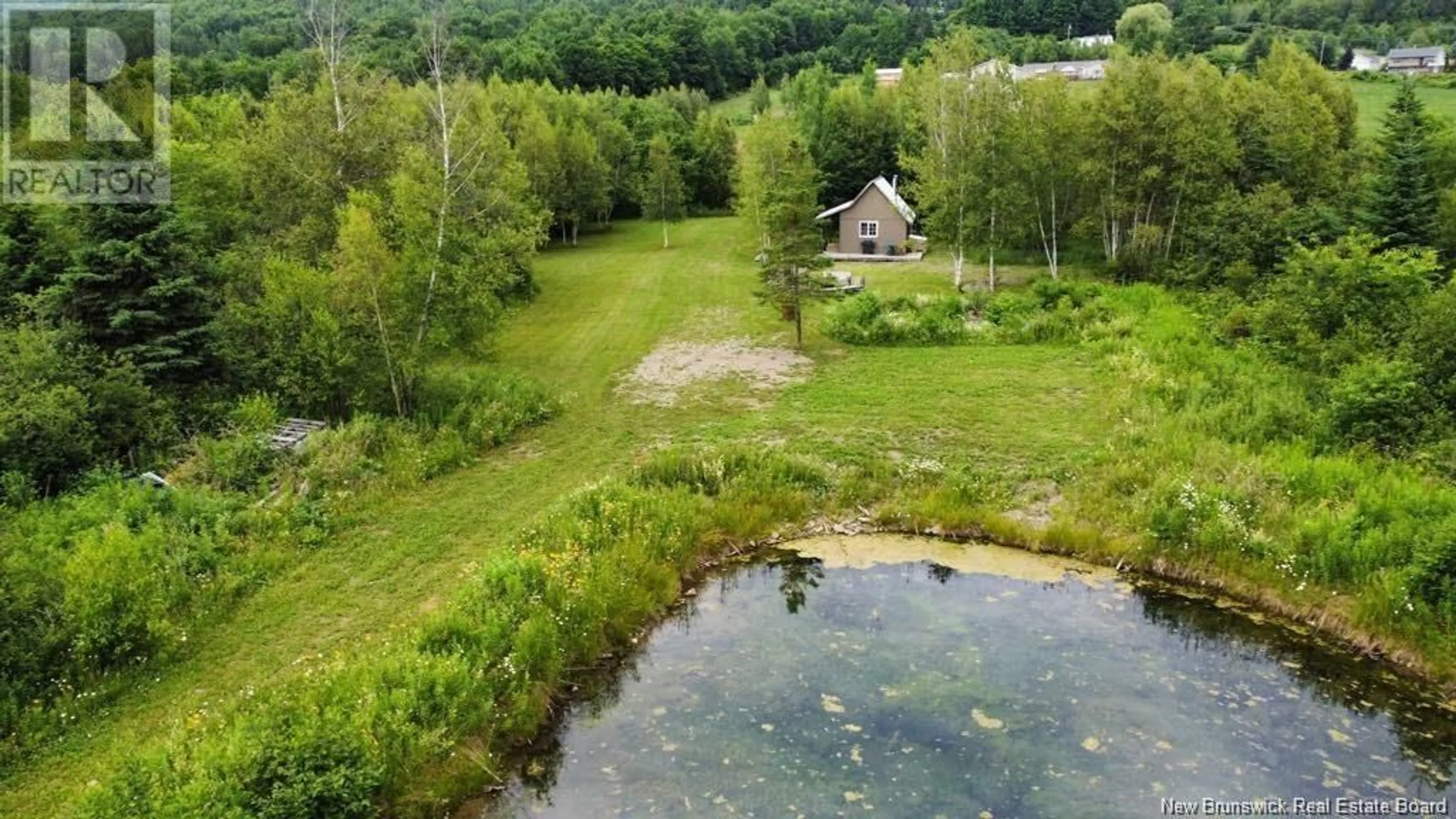 A pic from outside/outdoor area/front of a property/back of a property/a pic from drone, water/lake/river/ocean view for 245 Hunter Road, Oakland New Brunswick E7L3X8