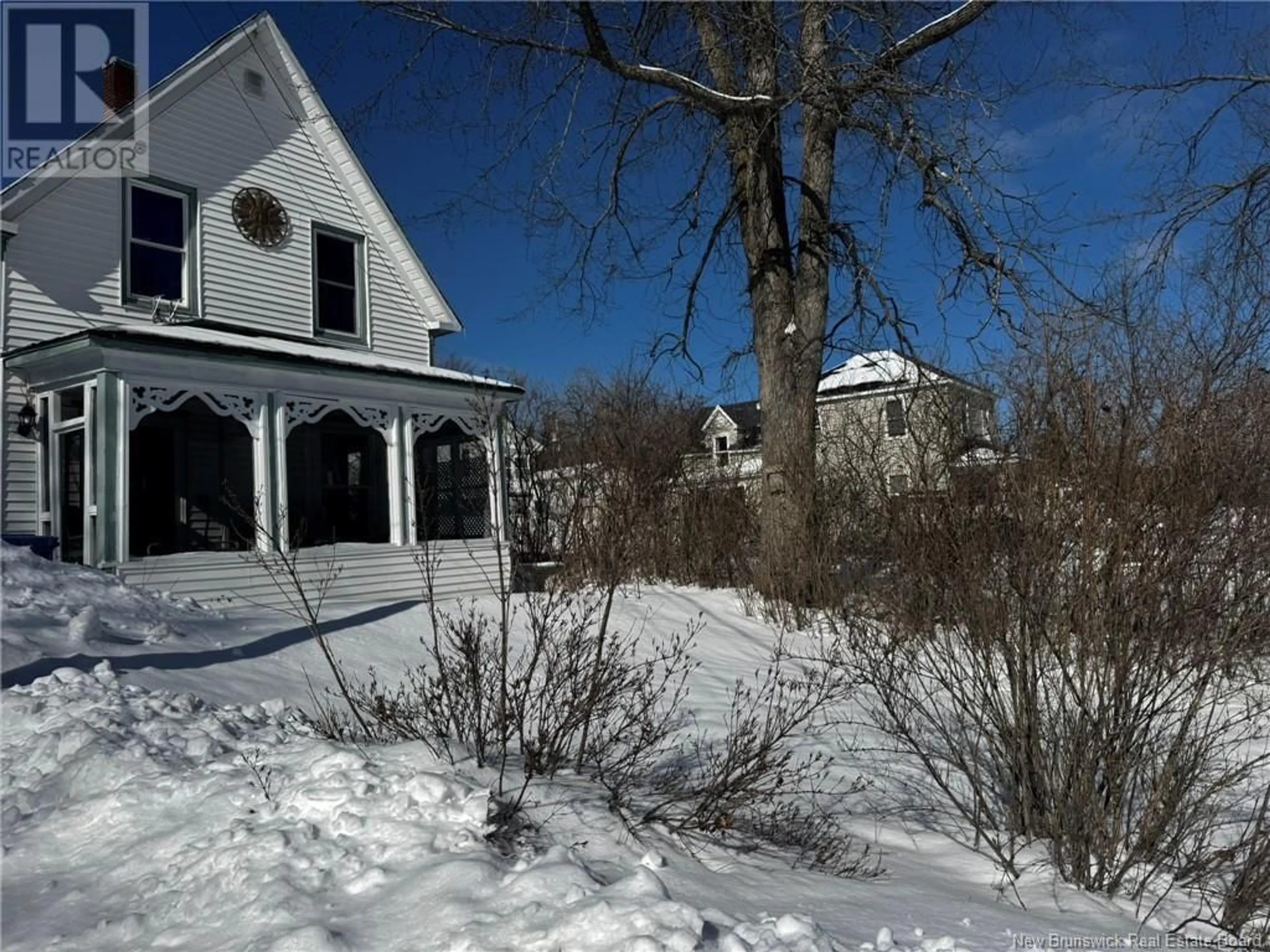 A pic from outside/outdoor area/front of a property/back of a property/a pic from drone, street for 415 Railway Avenue, Miramichi New Brunswick E1V1G2