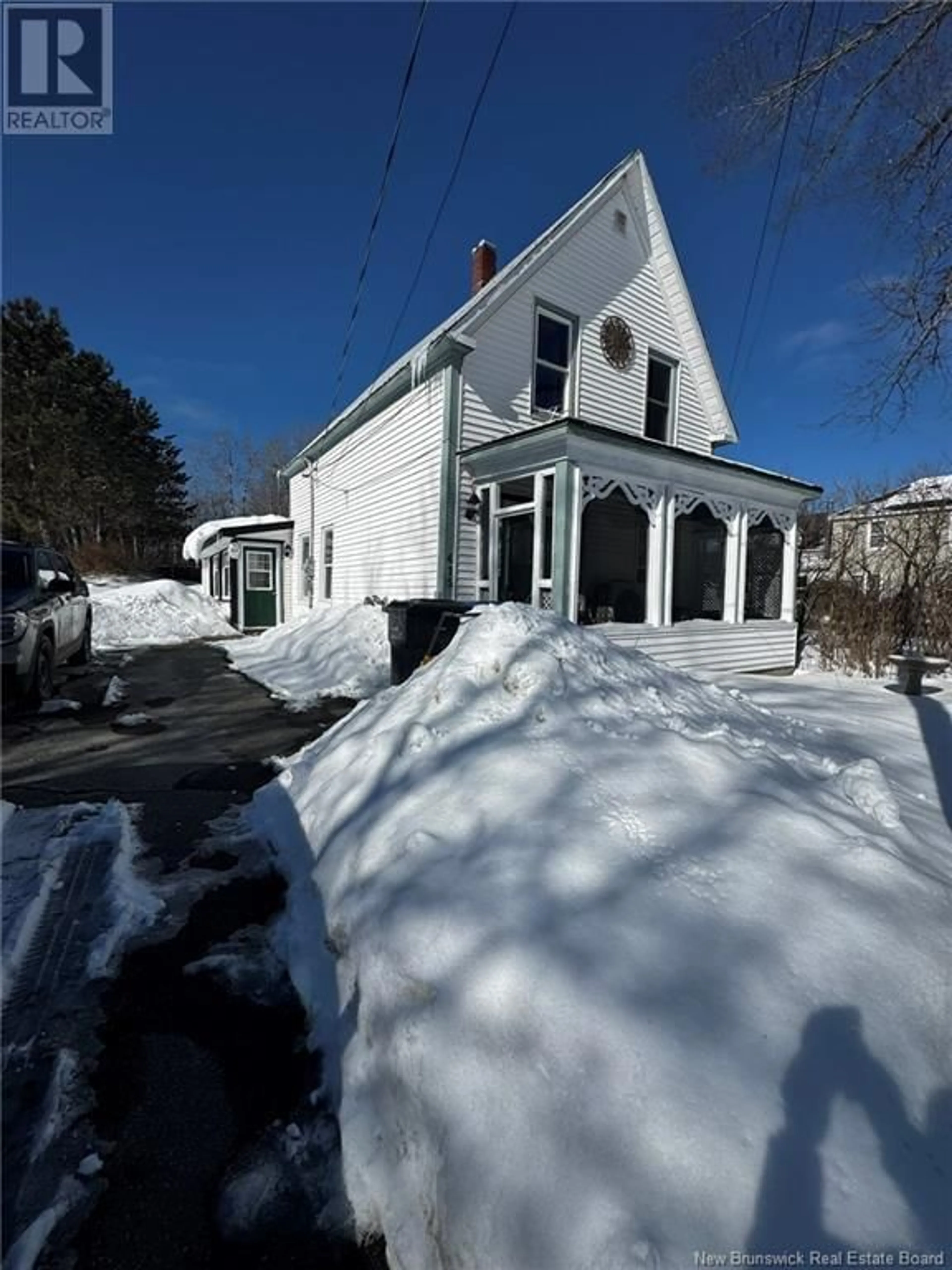 A pic from outside/outdoor area/front of a property/back of a property/a pic from drone, street for 415 Railway Avenue, Miramichi New Brunswick E1V1G2