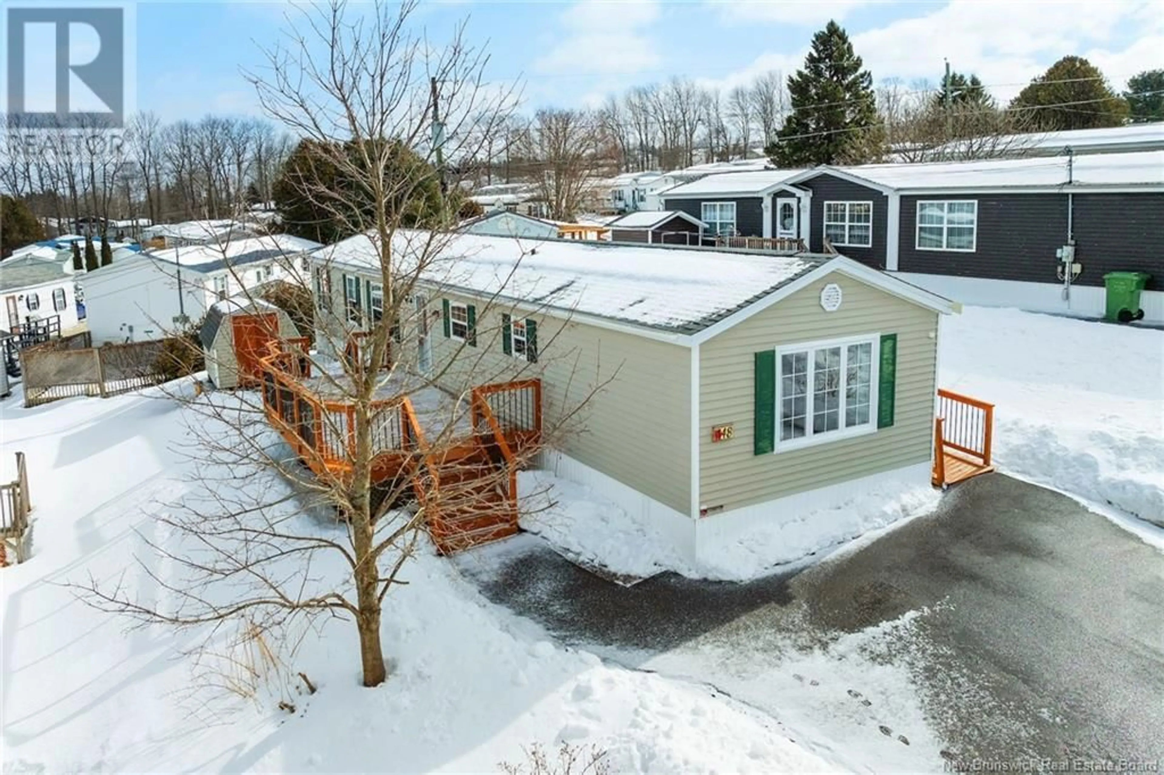 A pic from outside/outdoor area/front of a property/back of a property/a pic from drone, street for 48 Sherry's Lane, Fredericton New Brunswick E3C1L8