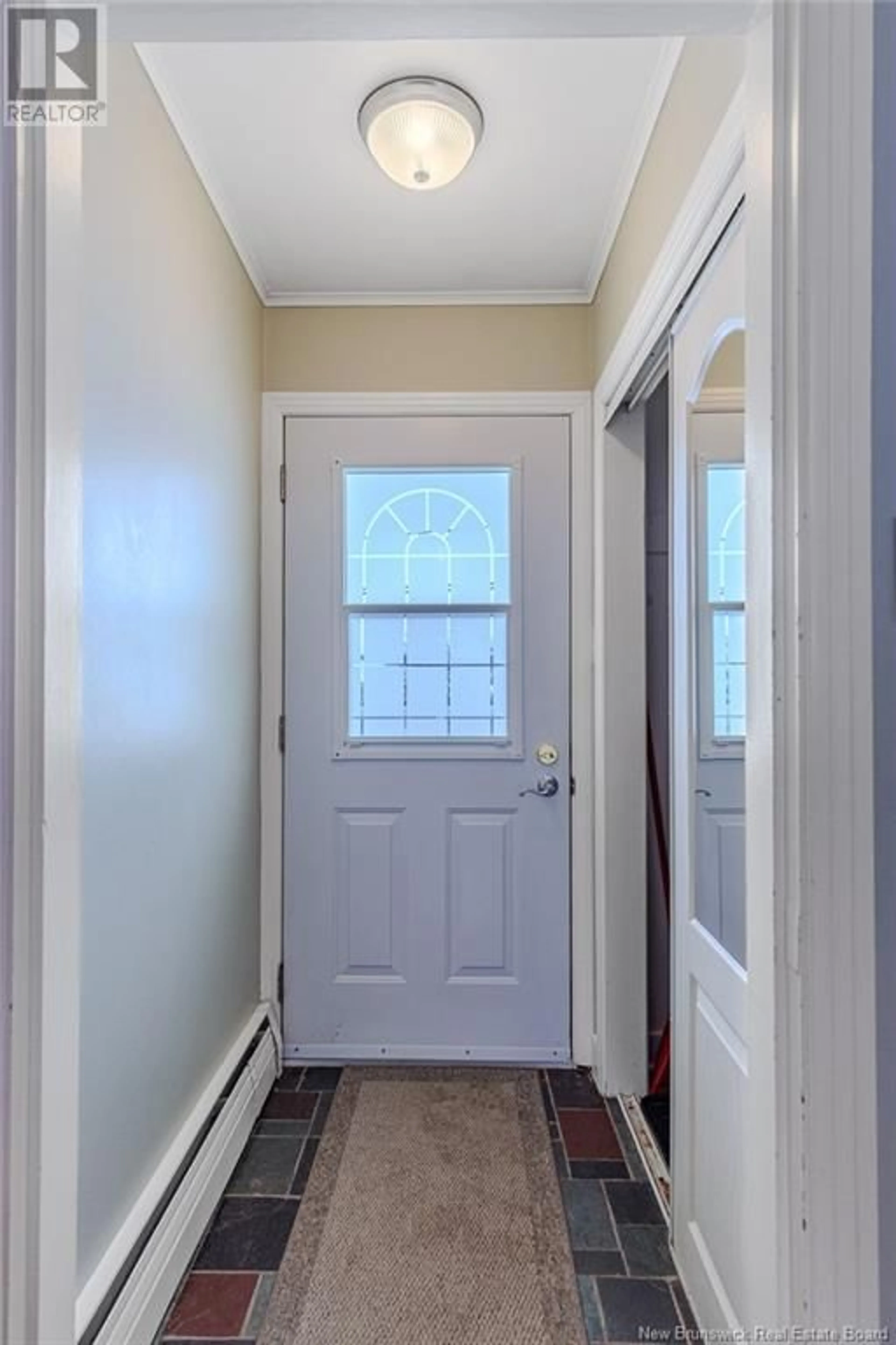 Indoor entryway for 68 Elizabeth Parkway, Rothesay New Brunswick E2H1E9