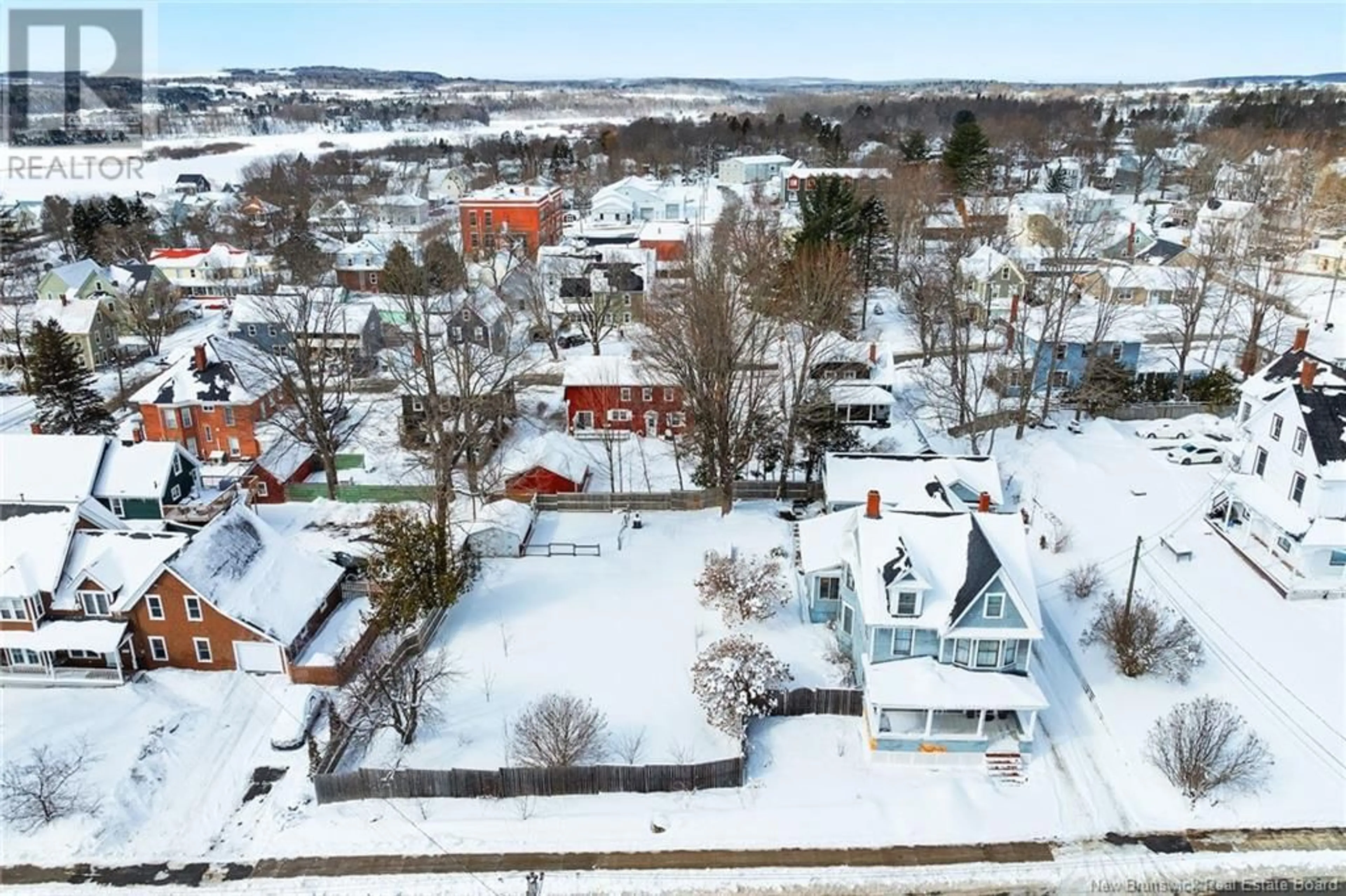 A pic from outside/outdoor area/front of a property/back of a property/a pic from drone, street for 115 Green Street, Woodstock New Brunswick E7M1T9