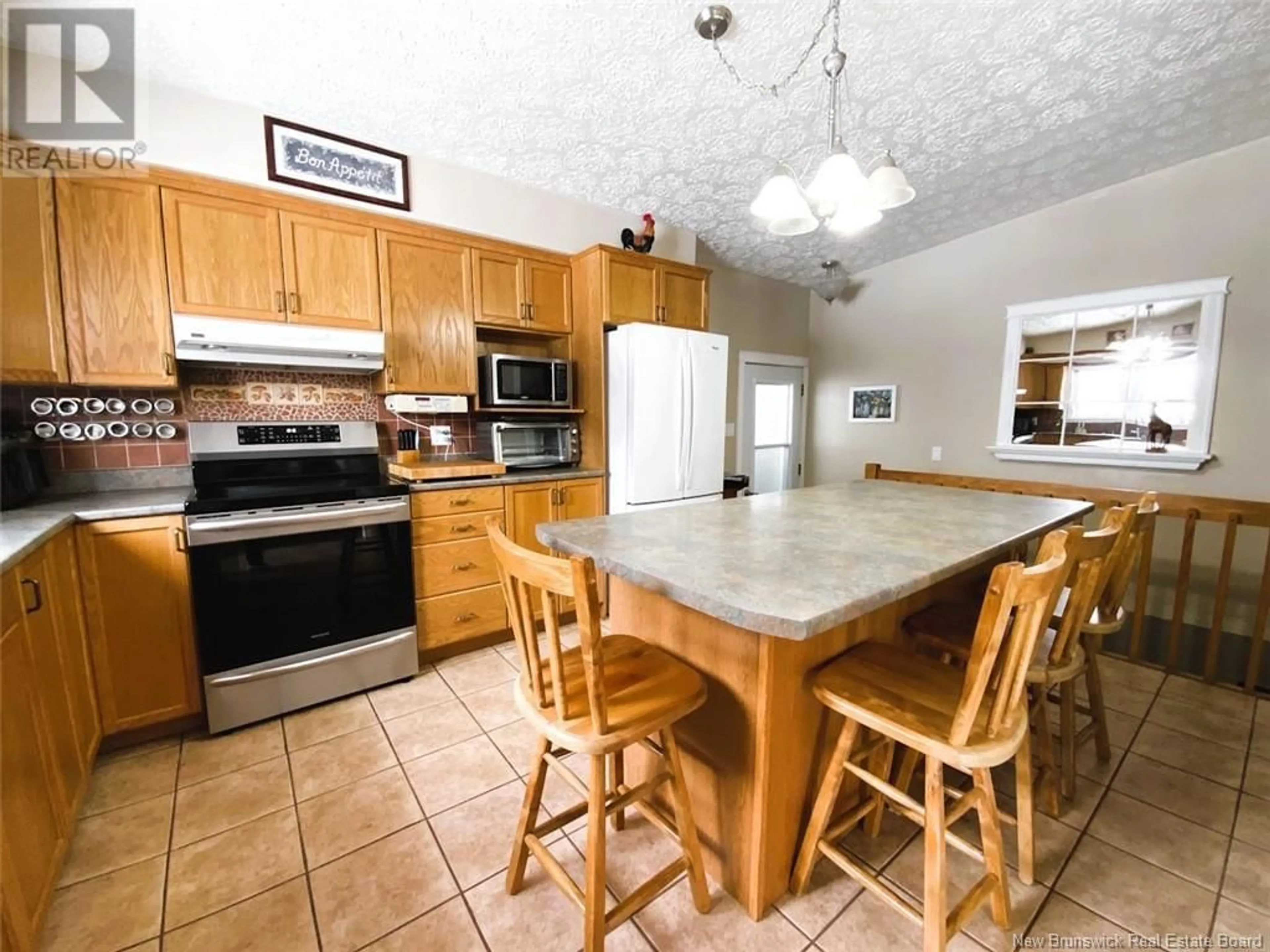 Standard kitchen, ceramic/tile floor for 287 MORIN AVENUE, Edmundston New Brunswick E3V3J6