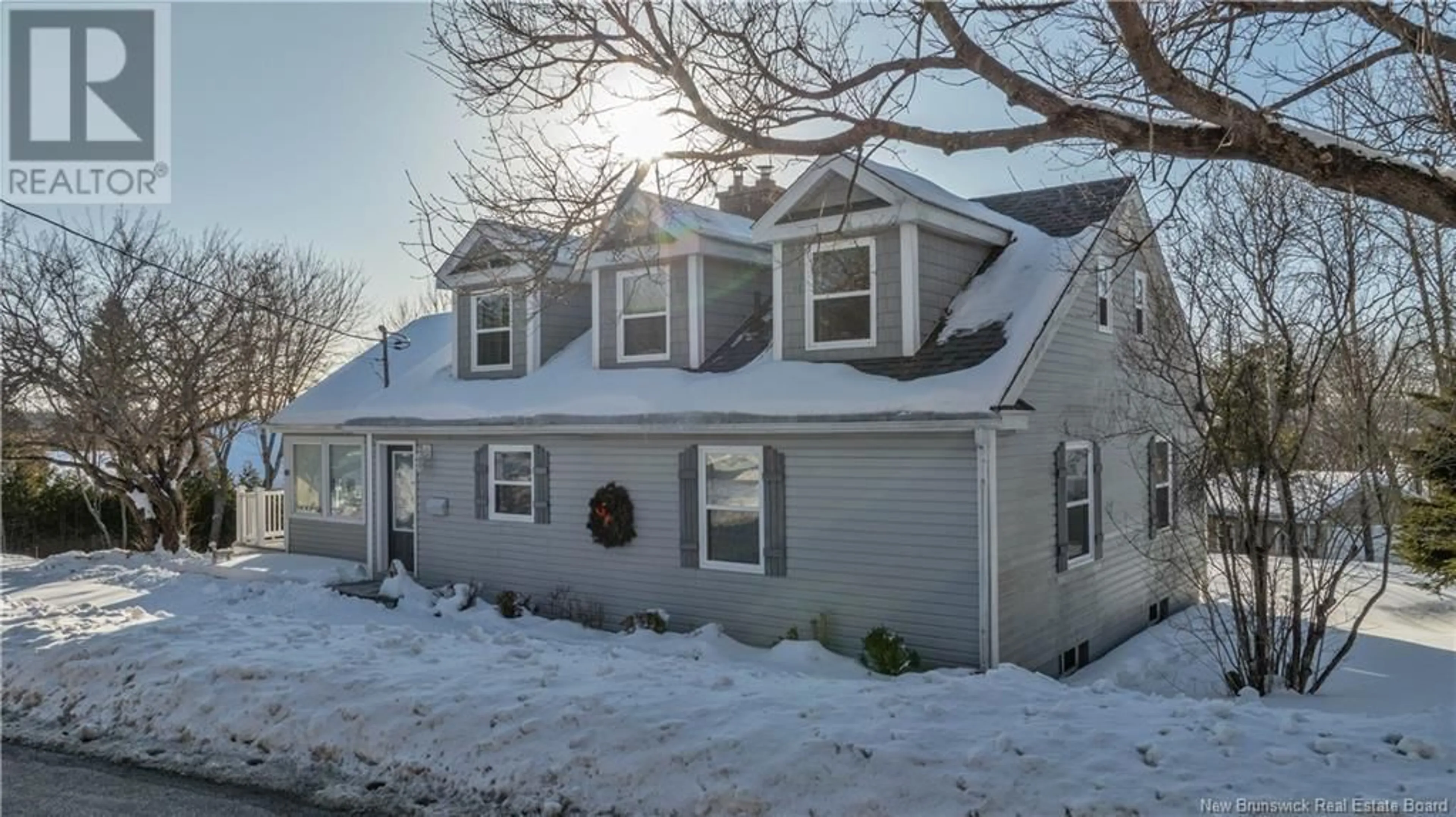 Home with vinyl exterior material, street for 69 Second Street, Rothesay New Brunswick E2H1M6