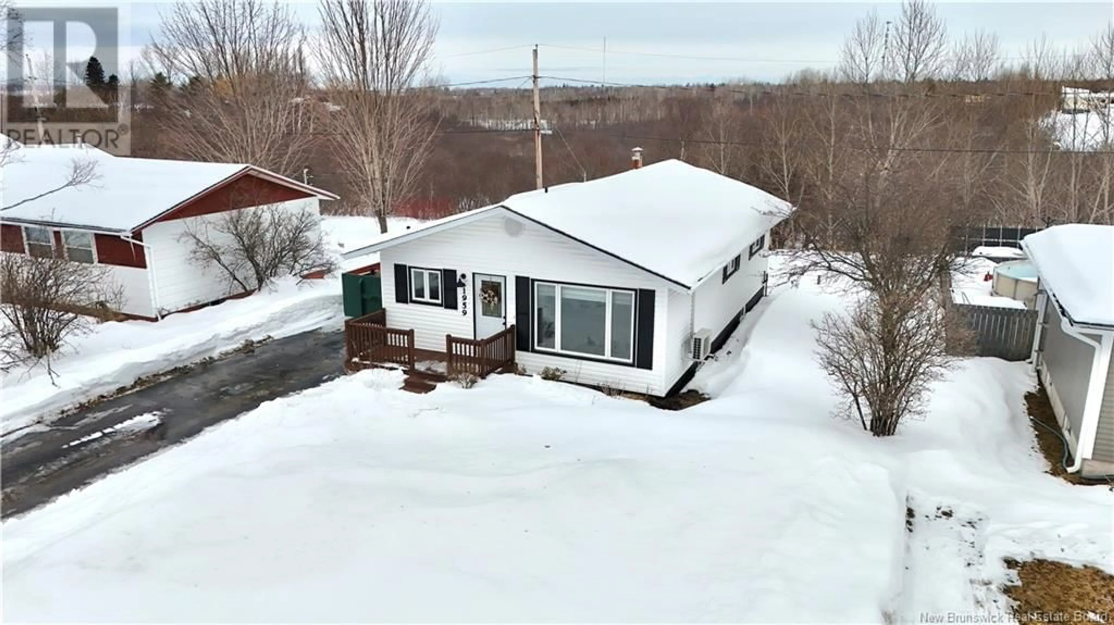 A pic from outside/outdoor area/front of a property/back of a property/a pic from drone, water/lake/river/ocean view for 1959 Hinton, Bathurst New Brunswick E2A4G3