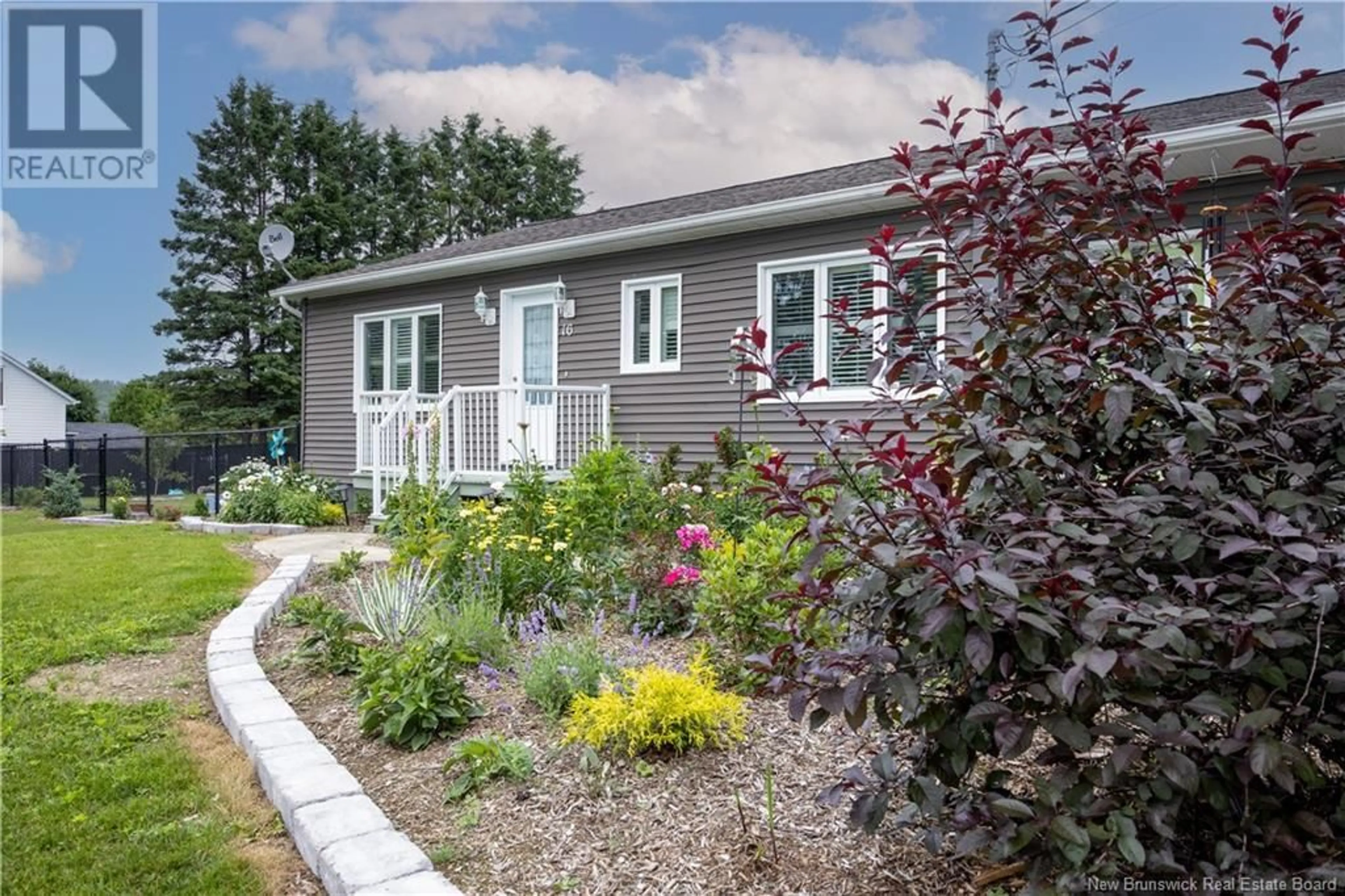 Home with vinyl exterior material, street for 16 Beaulieu Street, Grand-Sault/Grand Falls New Brunswick E3Y1C9