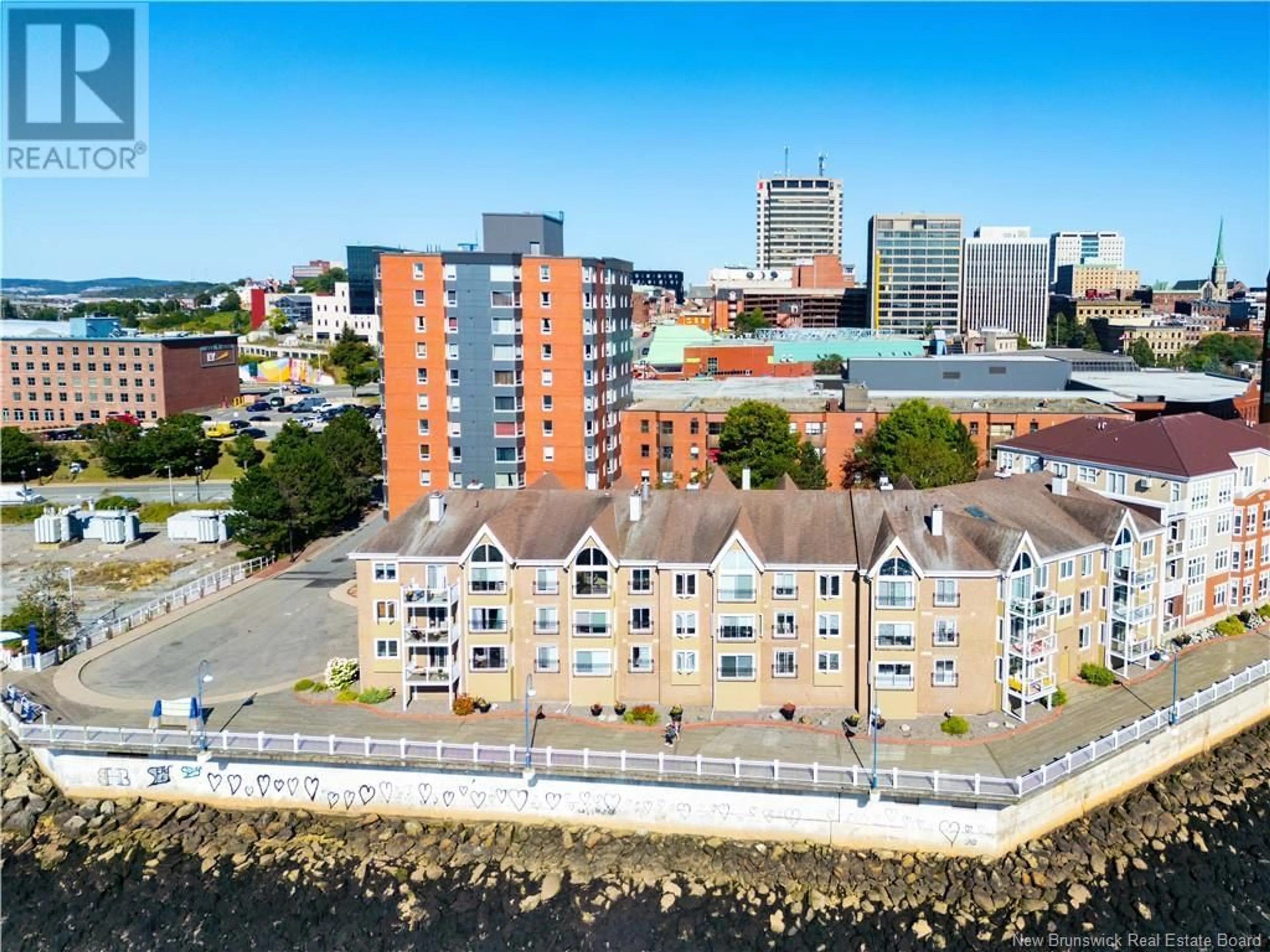 A pic from outside/outdoor area/front of a property/back of a property/a pic from drone, city buildings view from balcony for 2 Union Street Unit# 106, Saint John New Brunswick E2L5A7