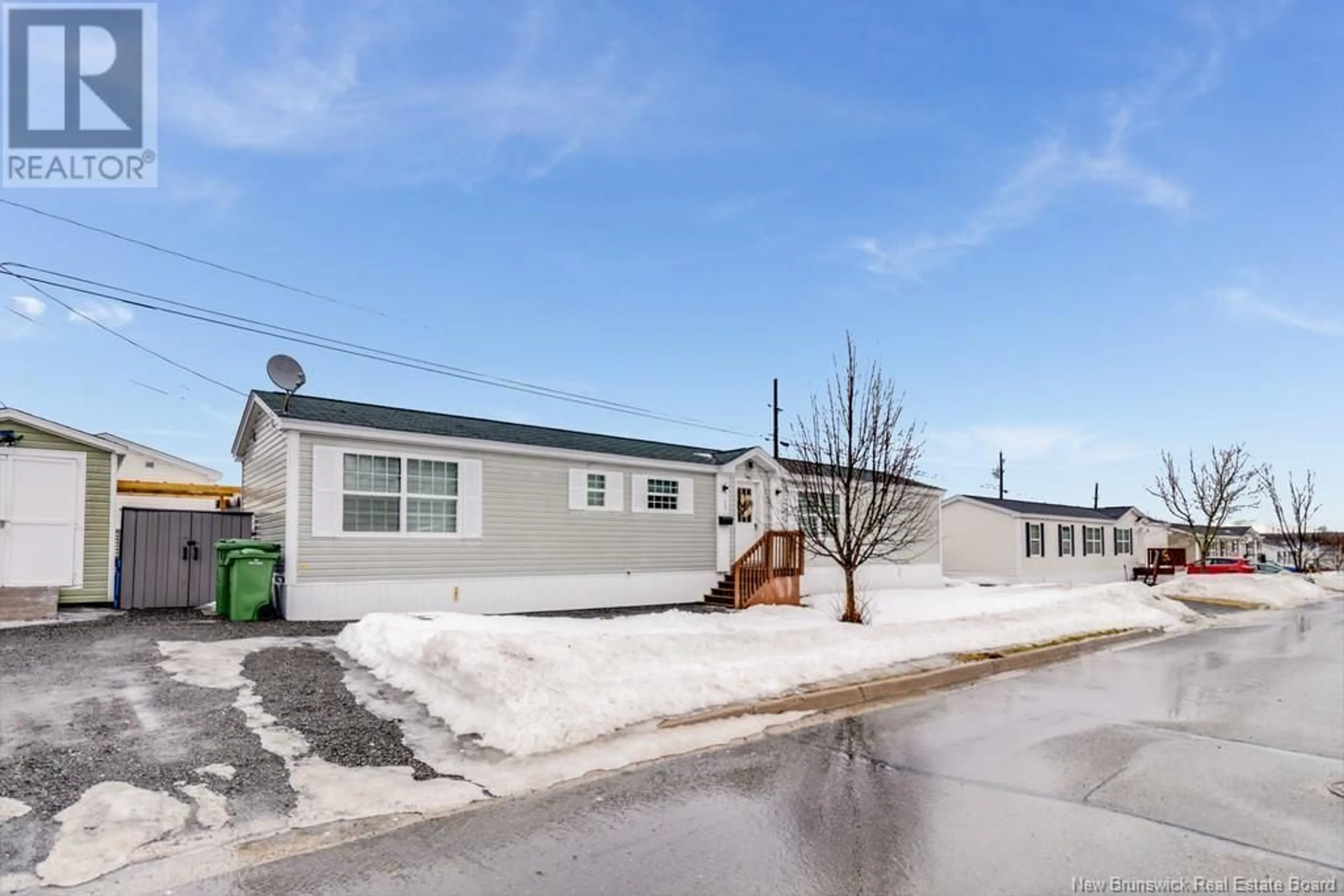 Home with vinyl exterior material, street for 147 Jacob Street, Fredericton New Brunswick E3G0R4