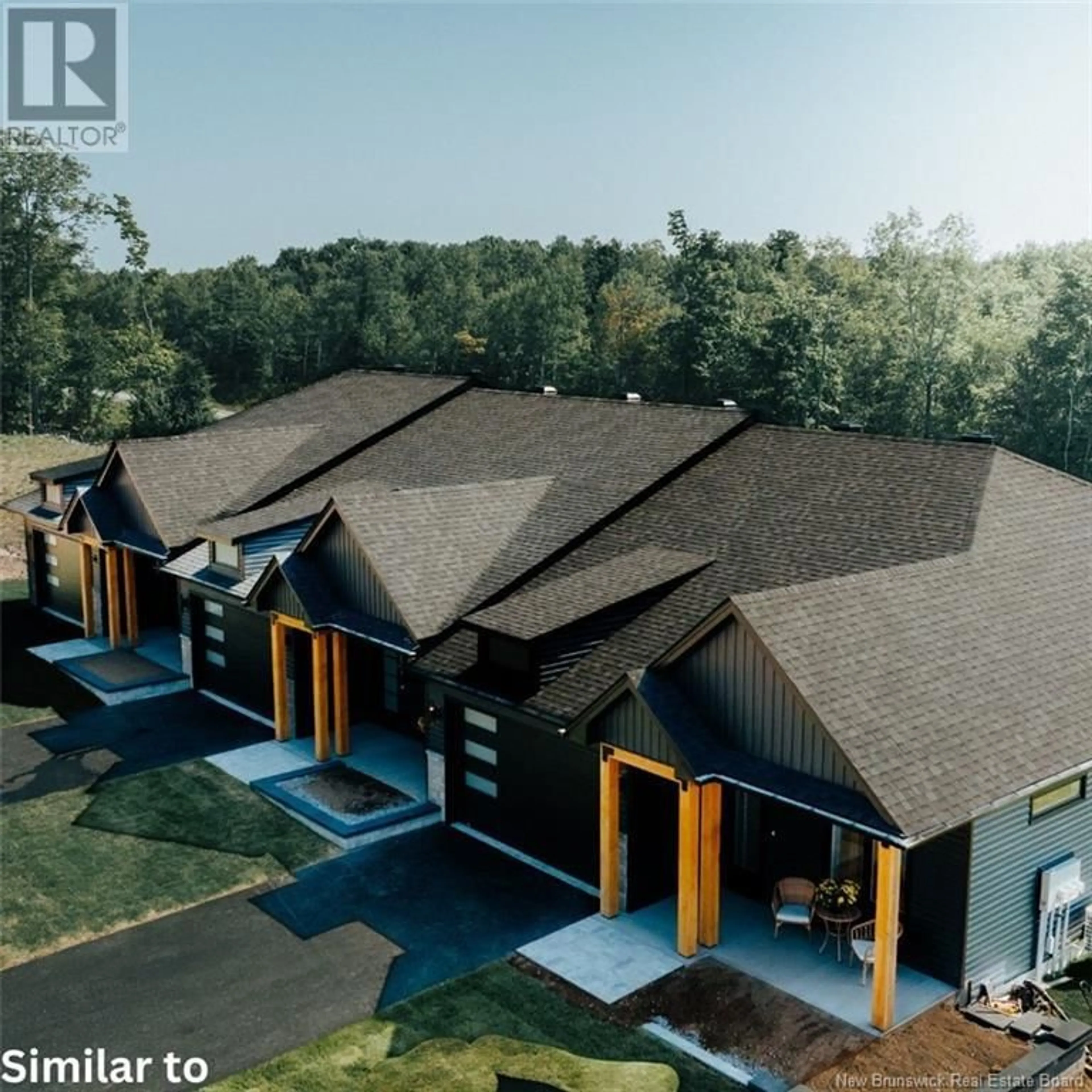 A pic from outside/outdoor area/front of a property/back of a property/a pic from drone, street for 5 WETMORE BOULEVARD, Quispamsis New Brunswick E2E2T8