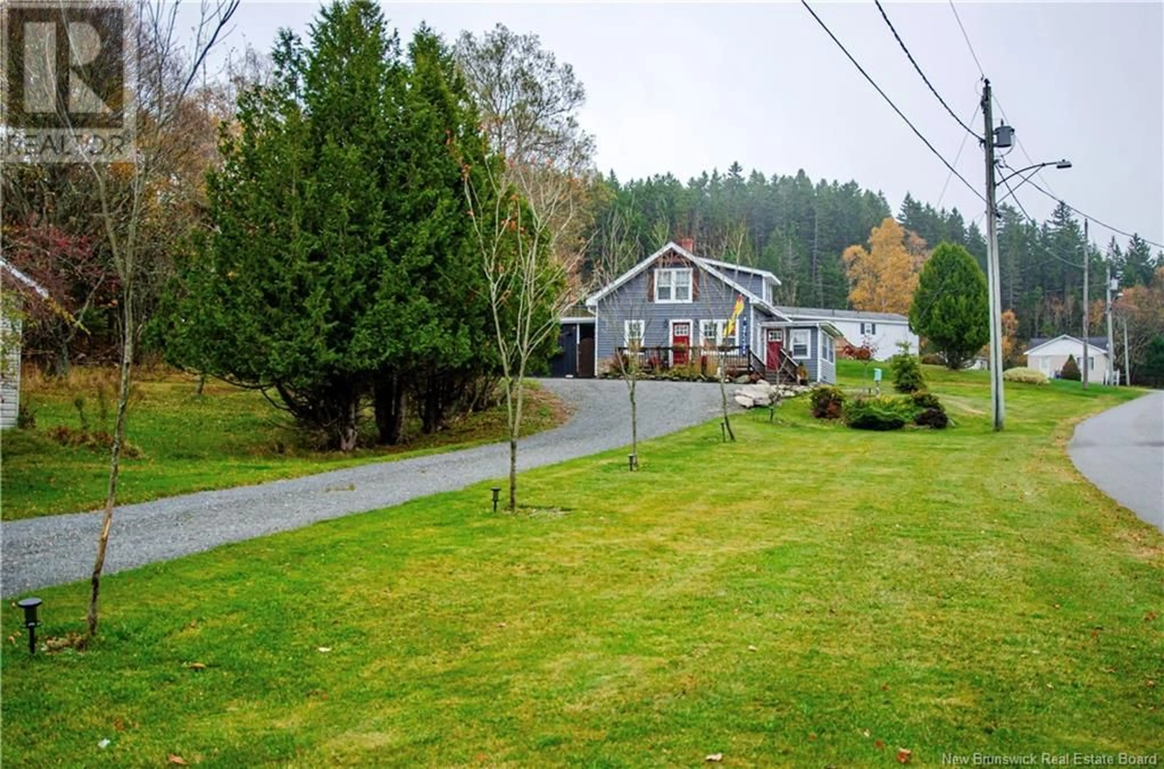 A pic from outside/outdoor area/front of a property/back of a property/a pic from drone, street for 5 WALLACE COVE ROAD, Blacks Harbour New Brunswick E5A1G9