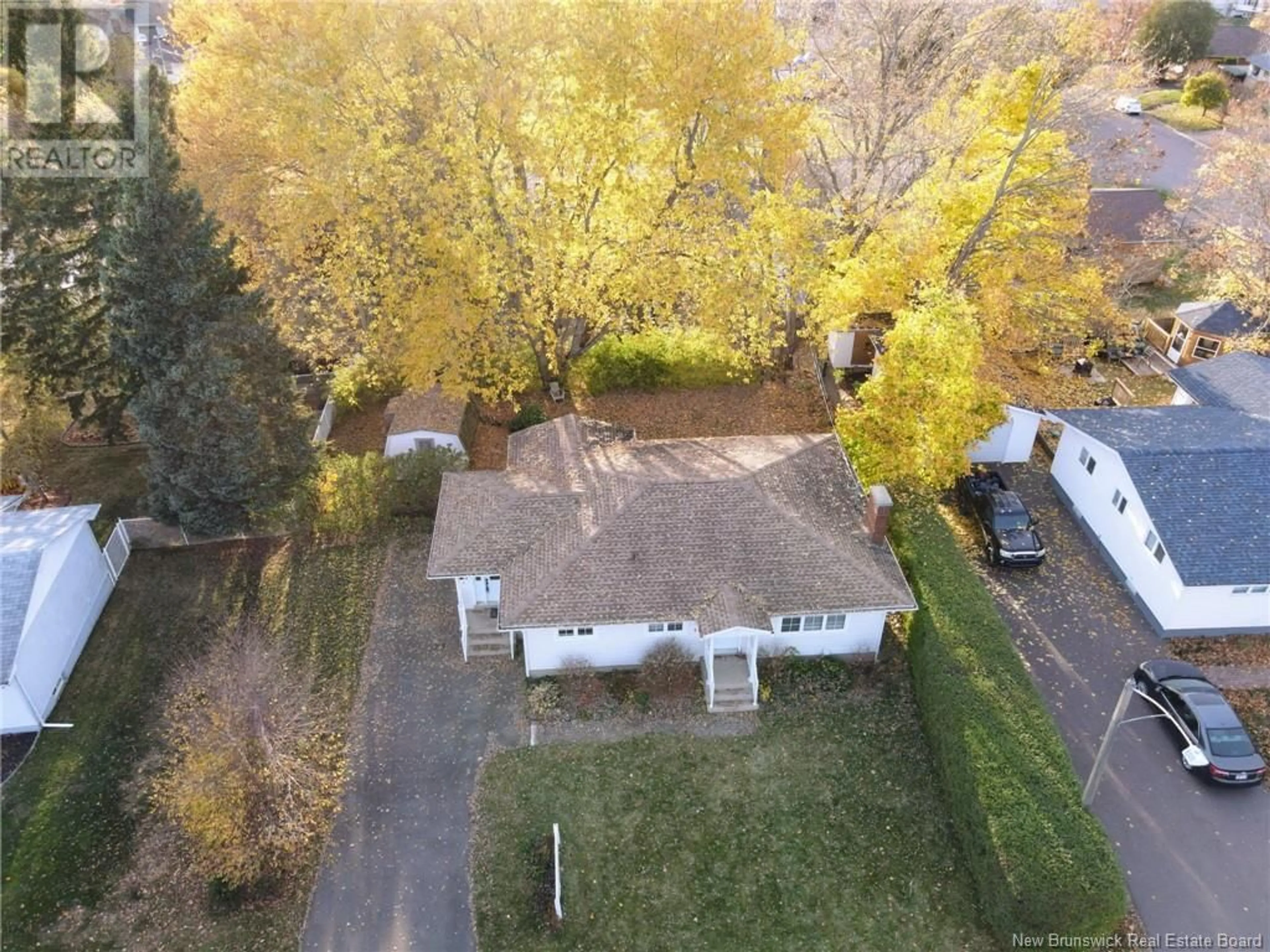 A pic from outside/outdoor area/front of a property/back of a property/a pic from drone, street for 563 Beausoleil Street, Dieppe New Brunswick E1A1C3