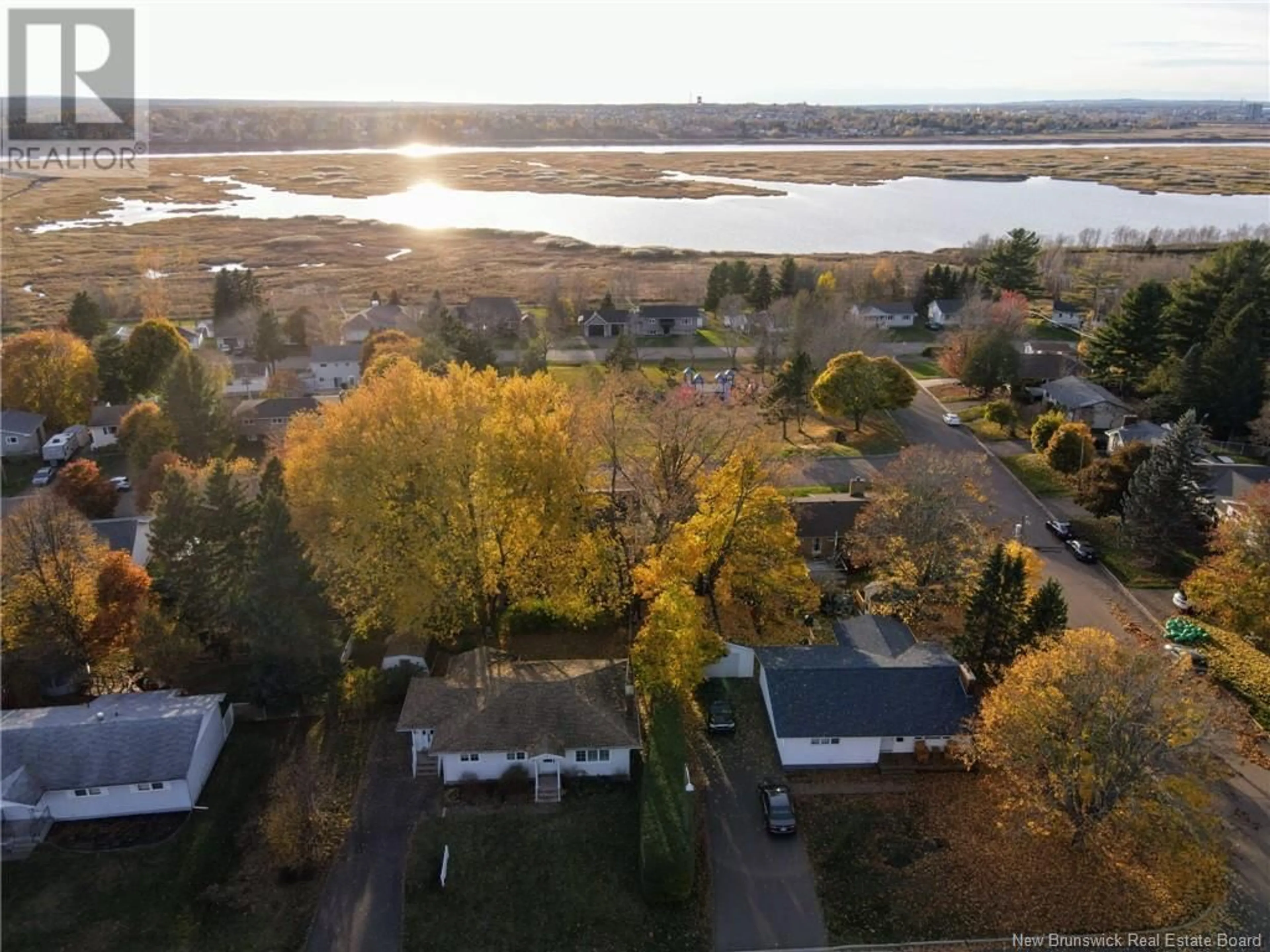 A pic from outside/outdoor area/front of a property/back of a property/a pic from drone, water/lake/river/ocean view for 563 Beausoleil Street, Dieppe New Brunswick E1A1C3