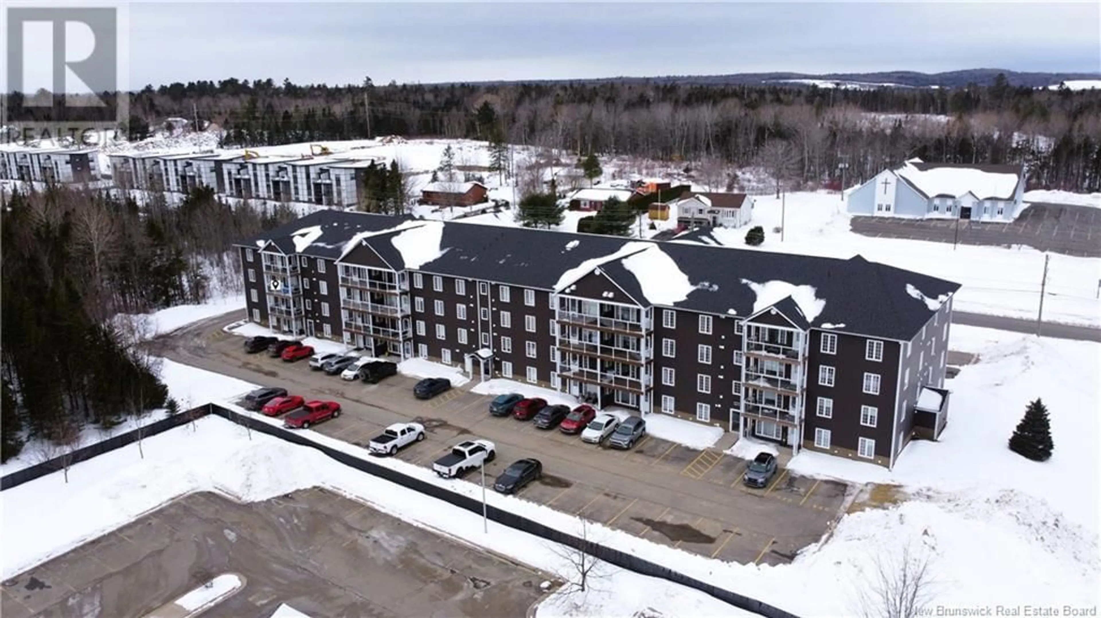 A pic from outside/outdoor area/front of a property/back of a property/a pic from drone, building for 225 Serenity Lane Unit# 325, Fredericton New Brunswick E3B0H1