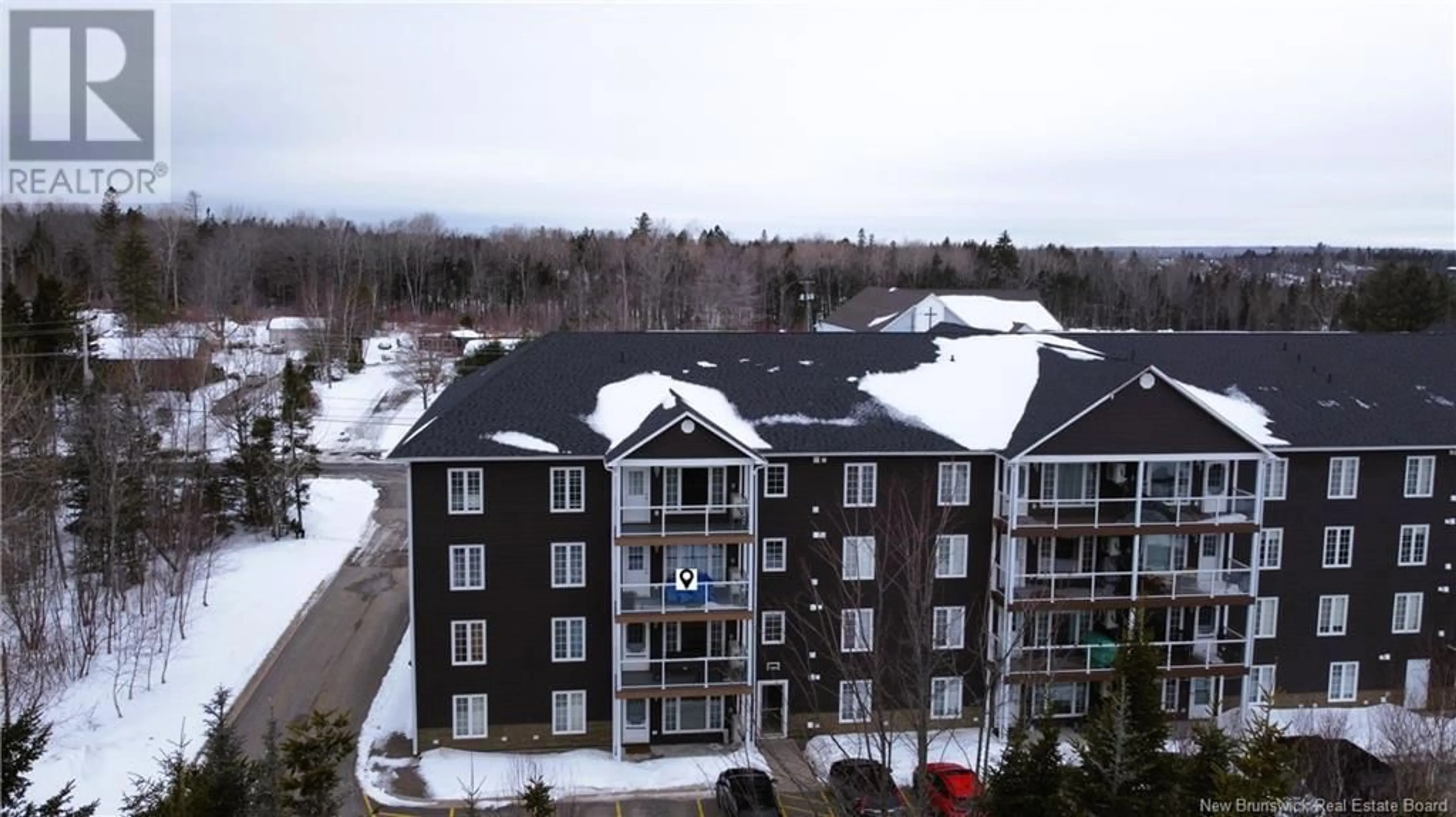 A pic from outside/outdoor area/front of a property/back of a property/a pic from drone, building for 225 Serenity Lane Unit# 325, Fredericton New Brunswick E3B0H1