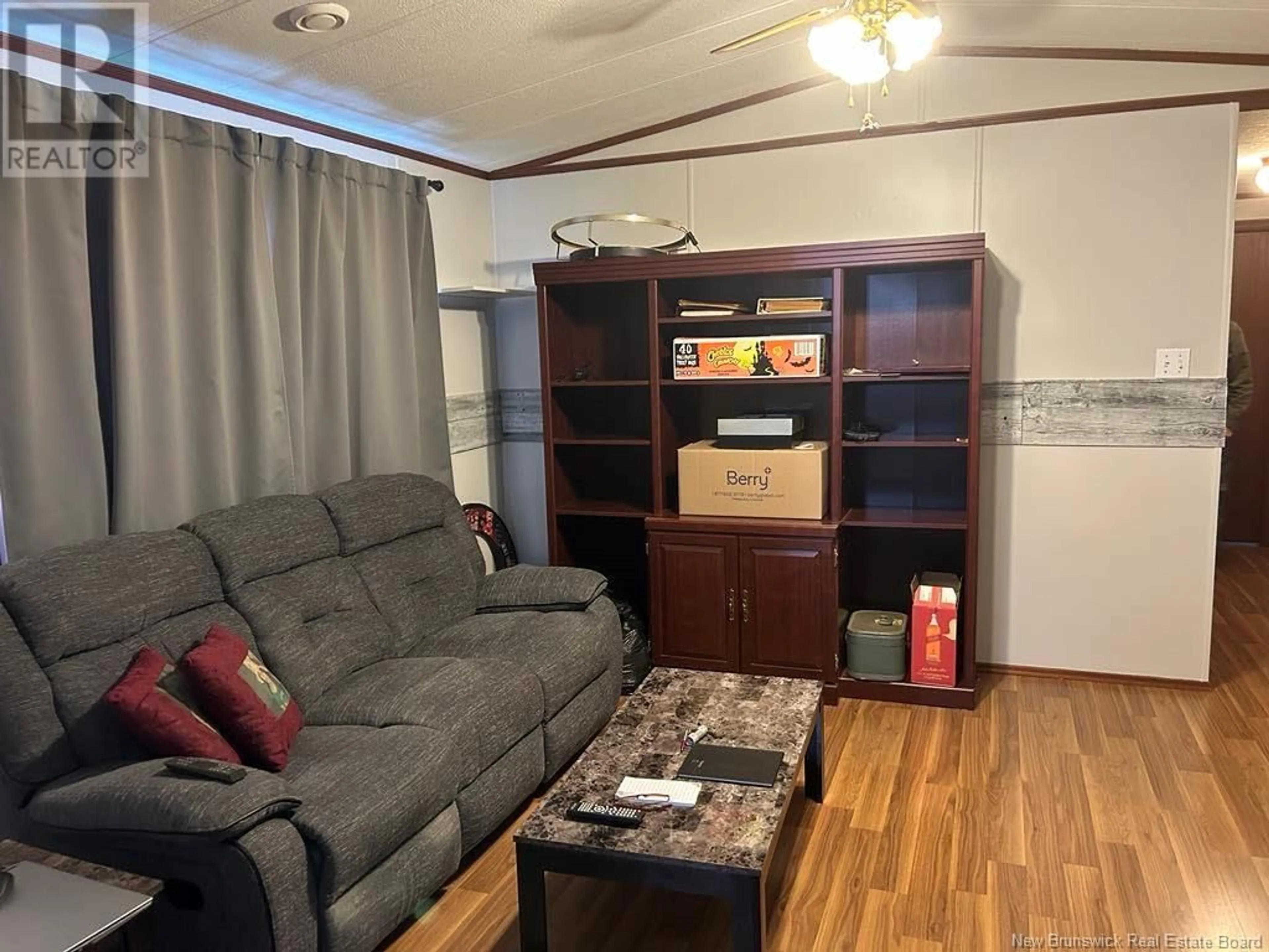 Living room with furniture, wood/laminate floor for 225 Purdy Drive, Saint John New Brunswick E2H2R2