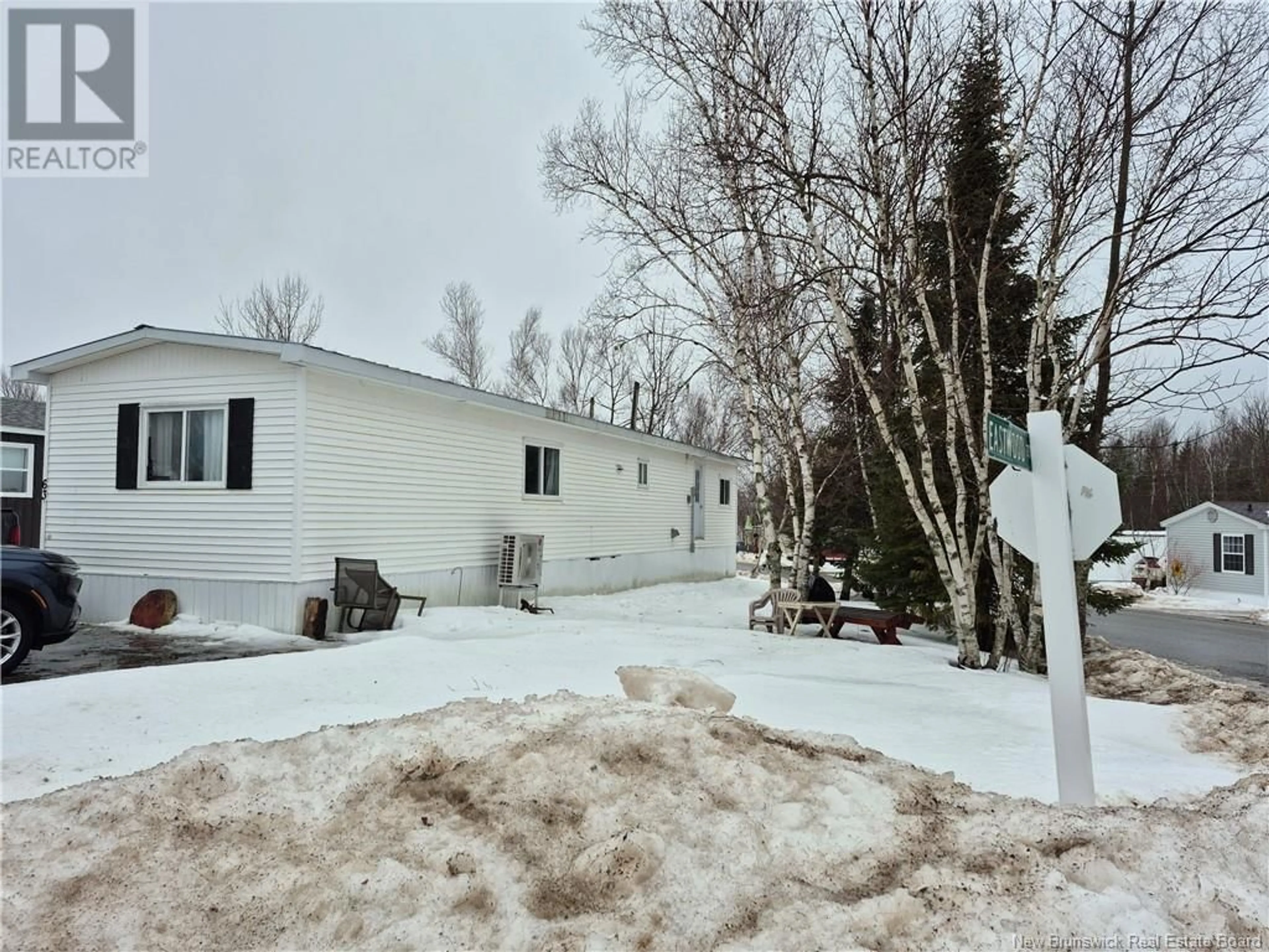 A pic from outside/outdoor area/front of a property/back of a property/a pic from drone, unknown for 63 Northwood Street, Fredericton New Brunswick E3B6R3