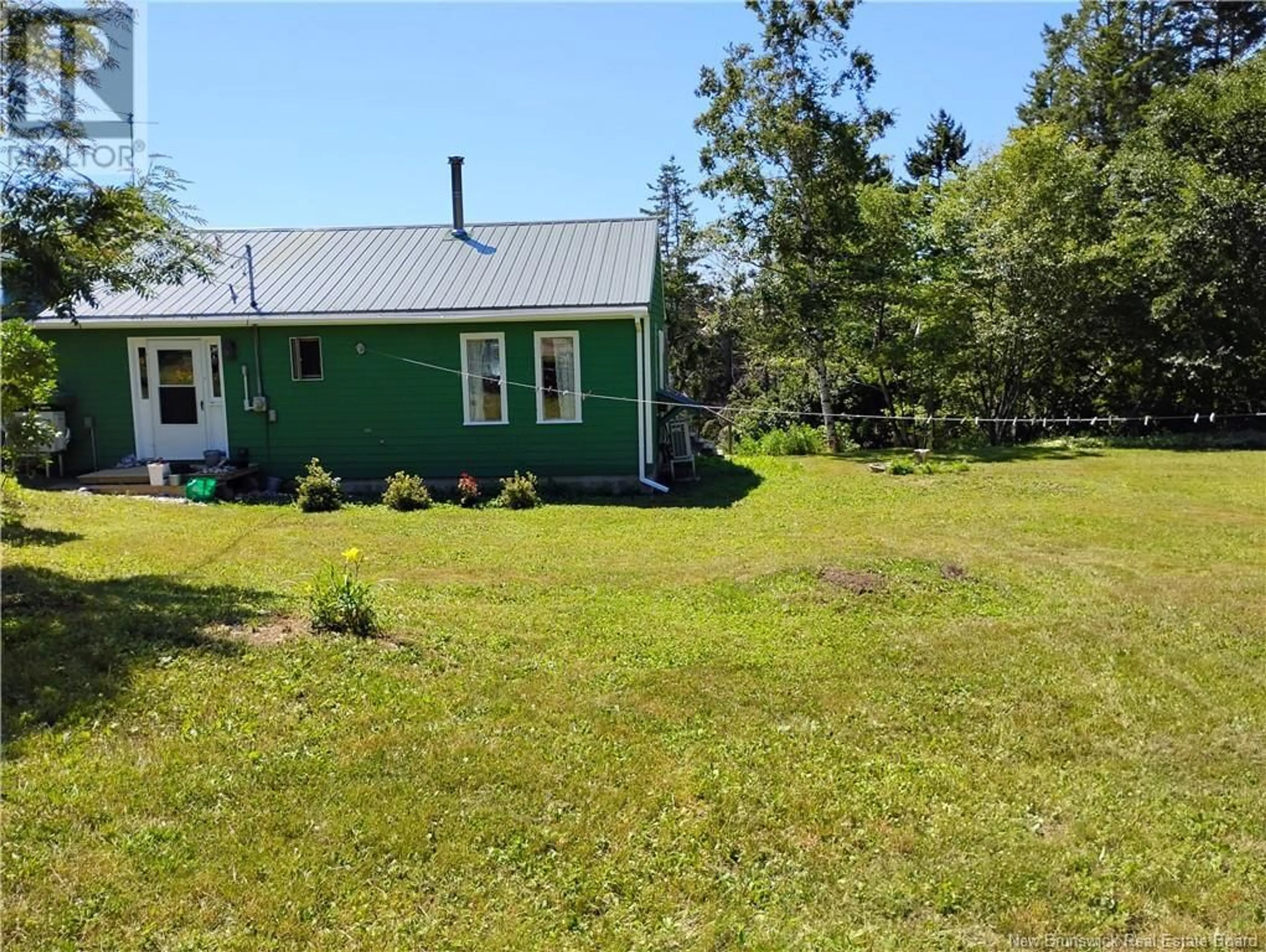 A pic from outside/outdoor area/front of a property/back of a property/a pic from drone, unknown for 9 Harbour Heights Drive, Welshpool New Brunswick E5E1H8