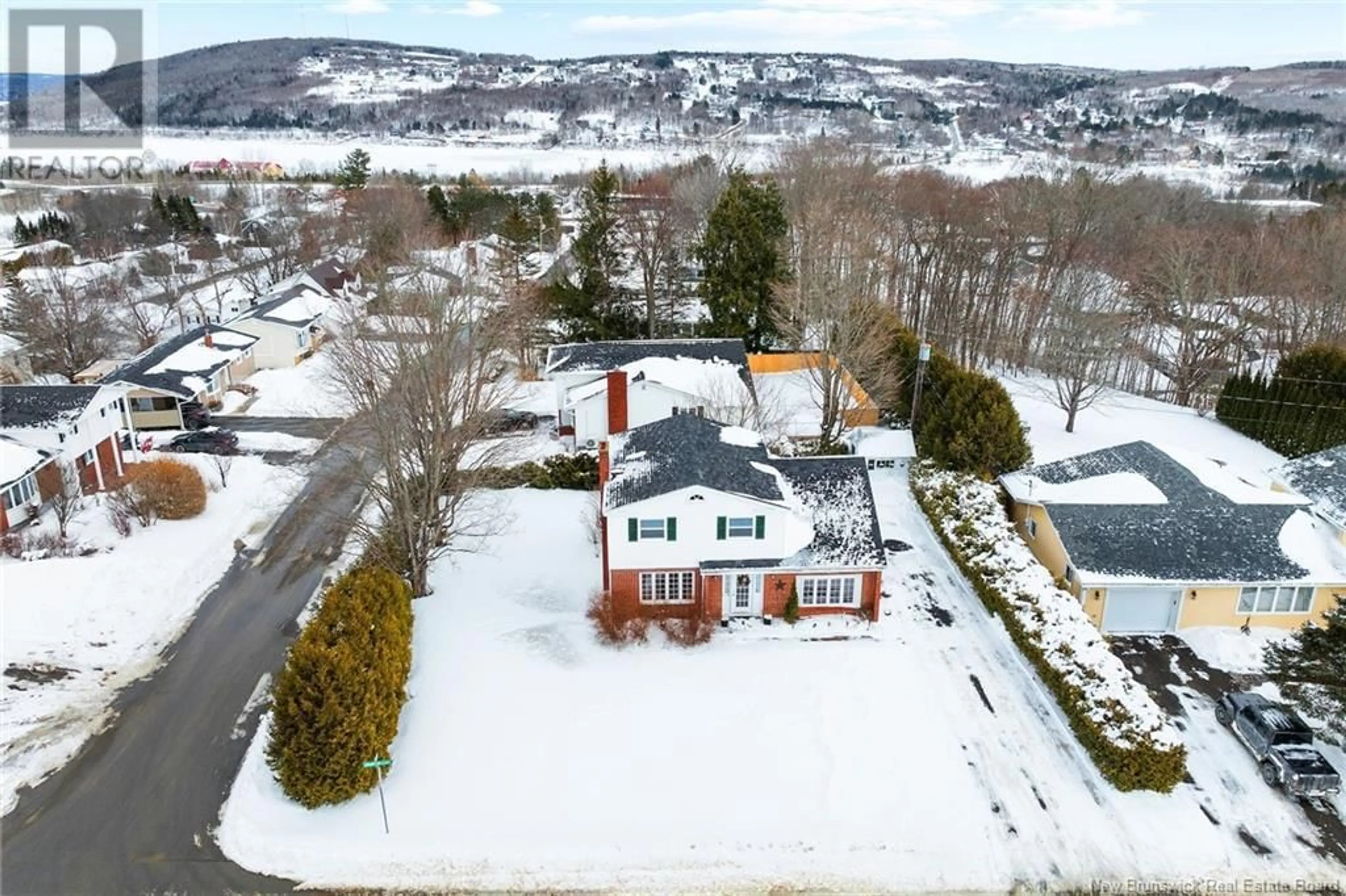 A pic from outside/outdoor area/front of a property/back of a property/a pic from drone, unknown for 118 Creighton Street, Woodstock New Brunswick E7M1N1