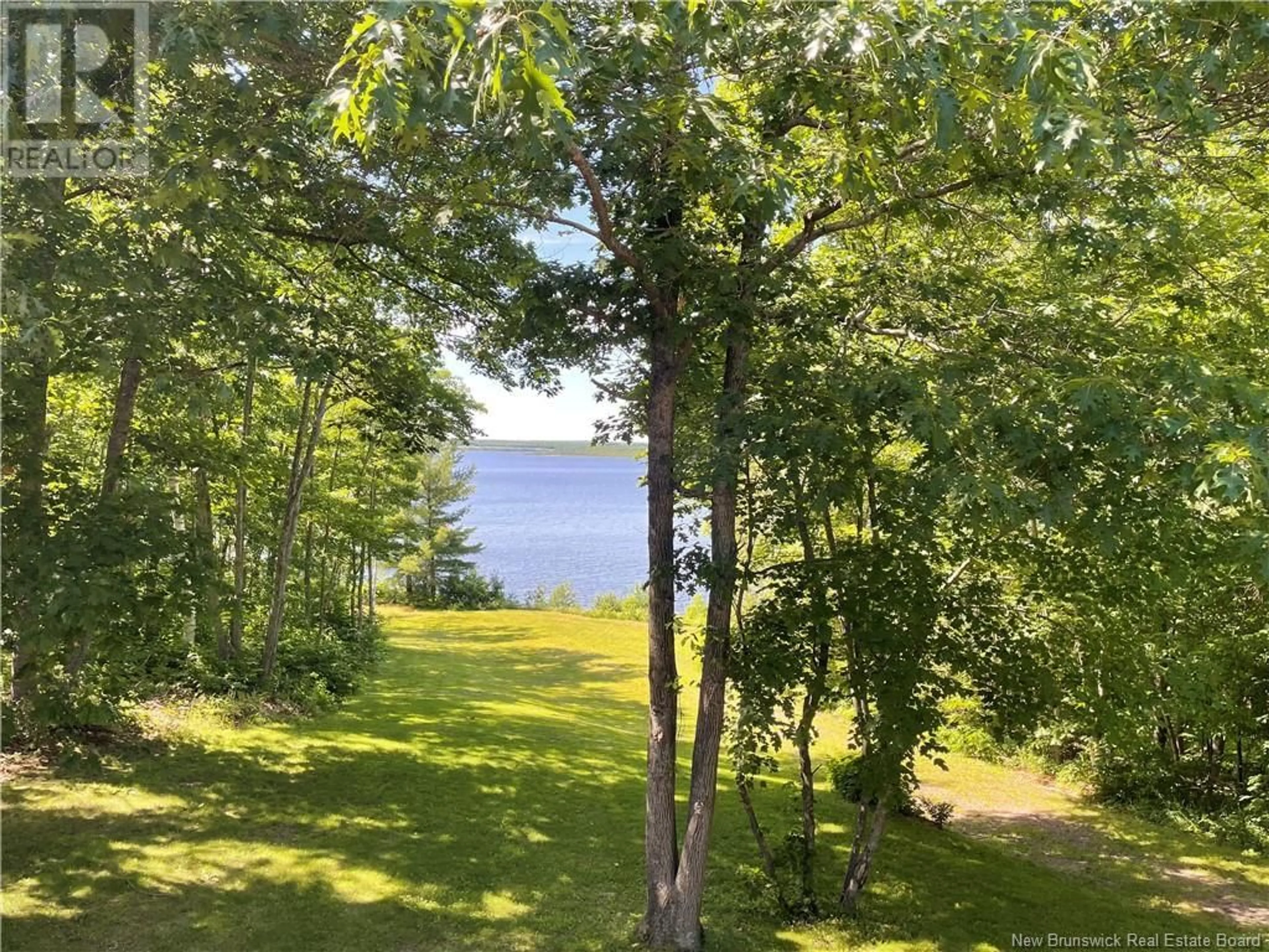 A pic from outside/outdoor area/front of a property/back of a property/a pic from drone, water/lake/river/ocean view for 602 COX POINT ROAD, Cumberland Bay New Brunswick E4A3N9