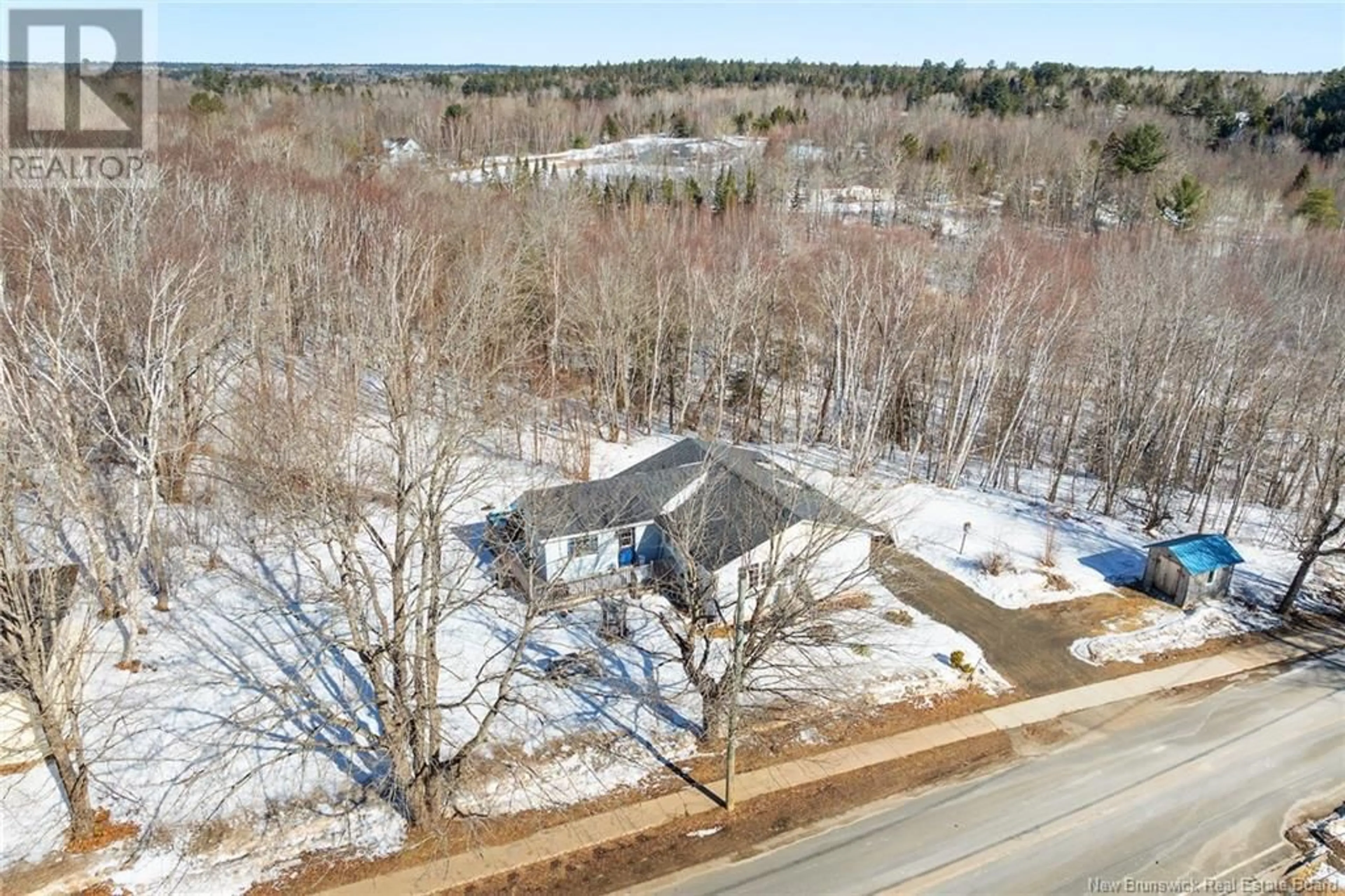 A pic from outside/outdoor area/front of a property/back of a property/a pic from drone, unknown for 49 King Street, Minto New Brunswick E4B3N6