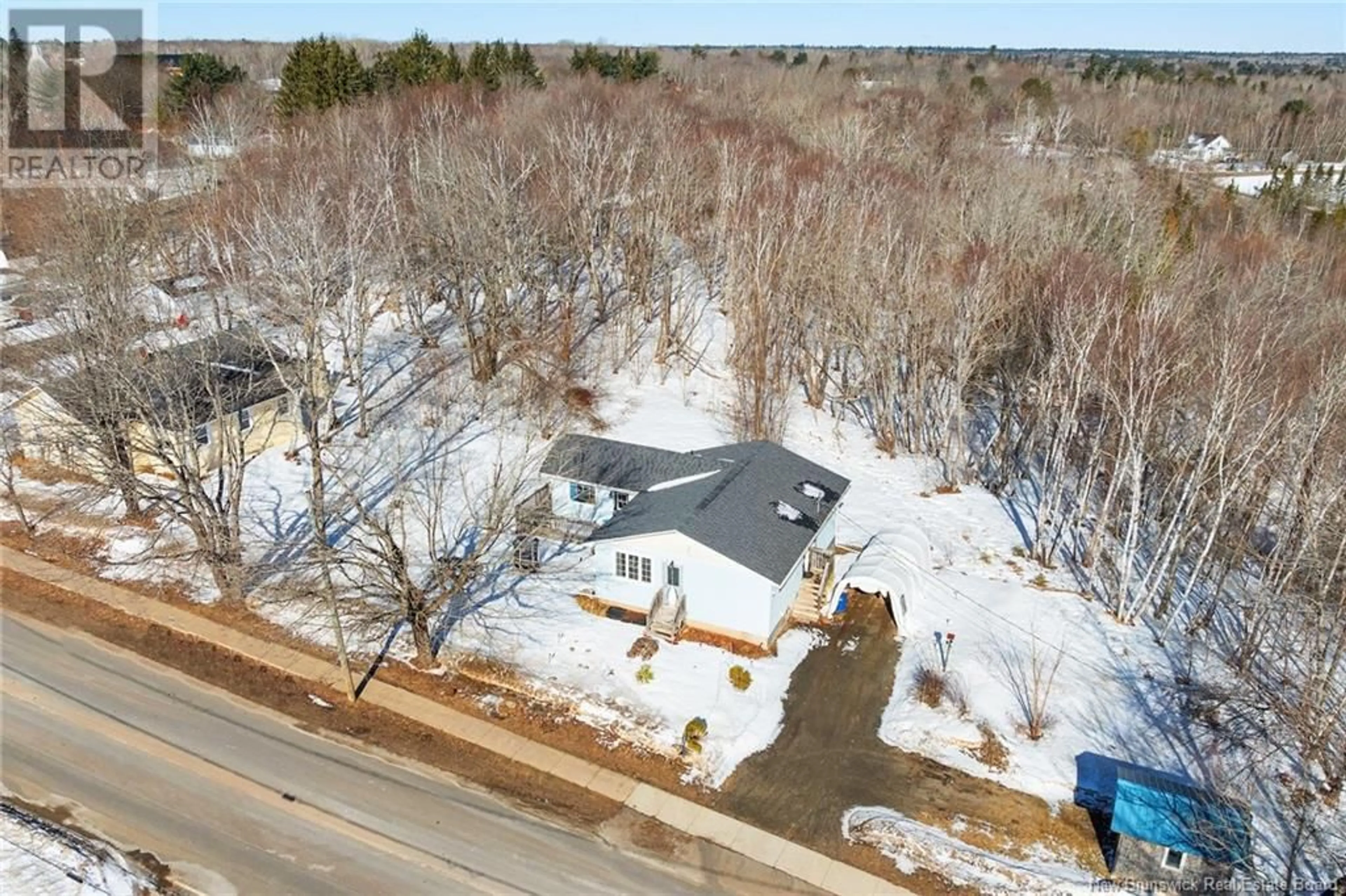 A pic from outside/outdoor area/front of a property/back of a property/a pic from drone, street for 49 King Street, Minto New Brunswick E4B3N6