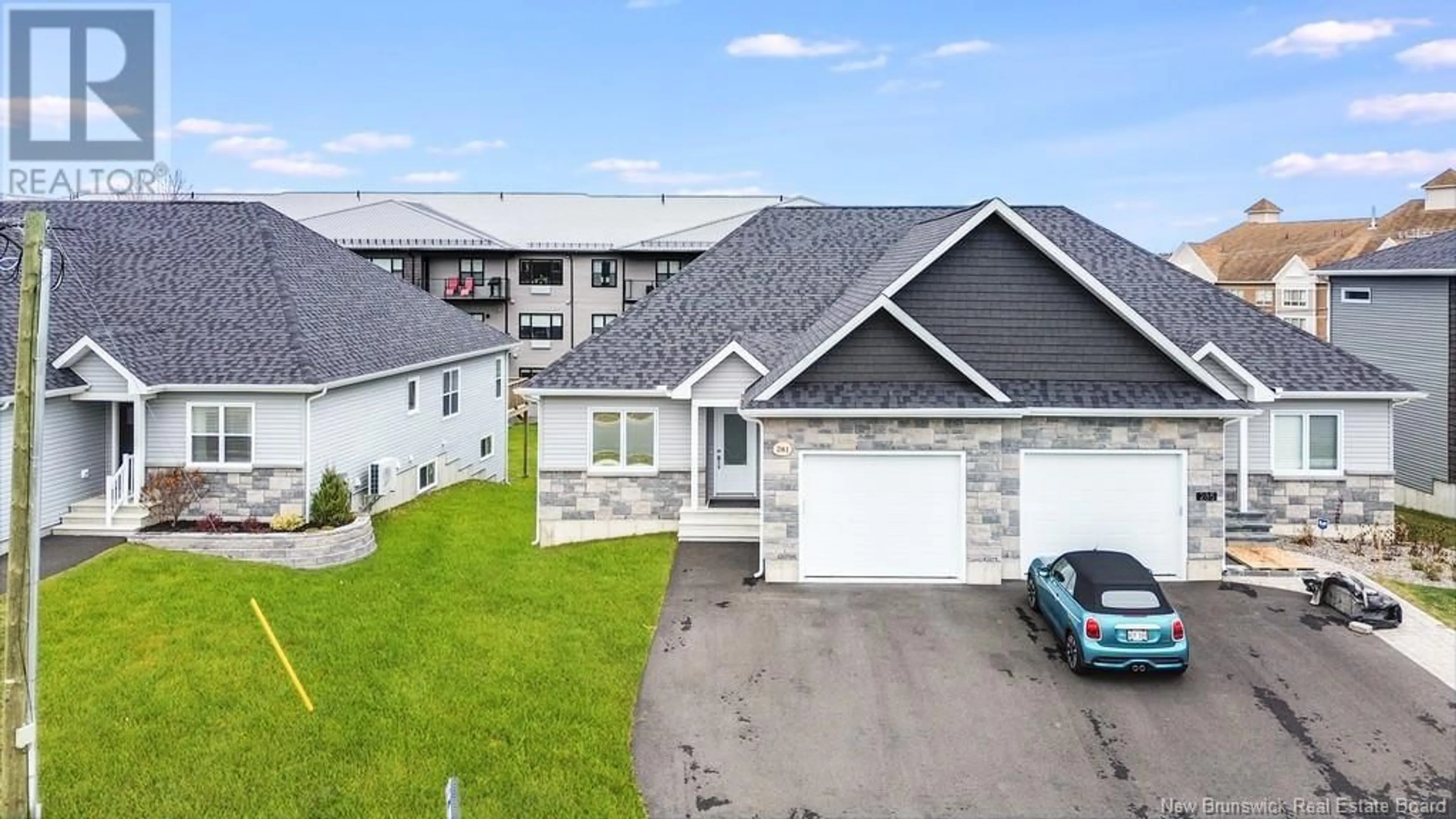A pic from outside/outdoor area/front of a property/back of a property/a pic from drone, street for 281 RAINSFORD LANE, Fredericton New Brunswick E3B7T1