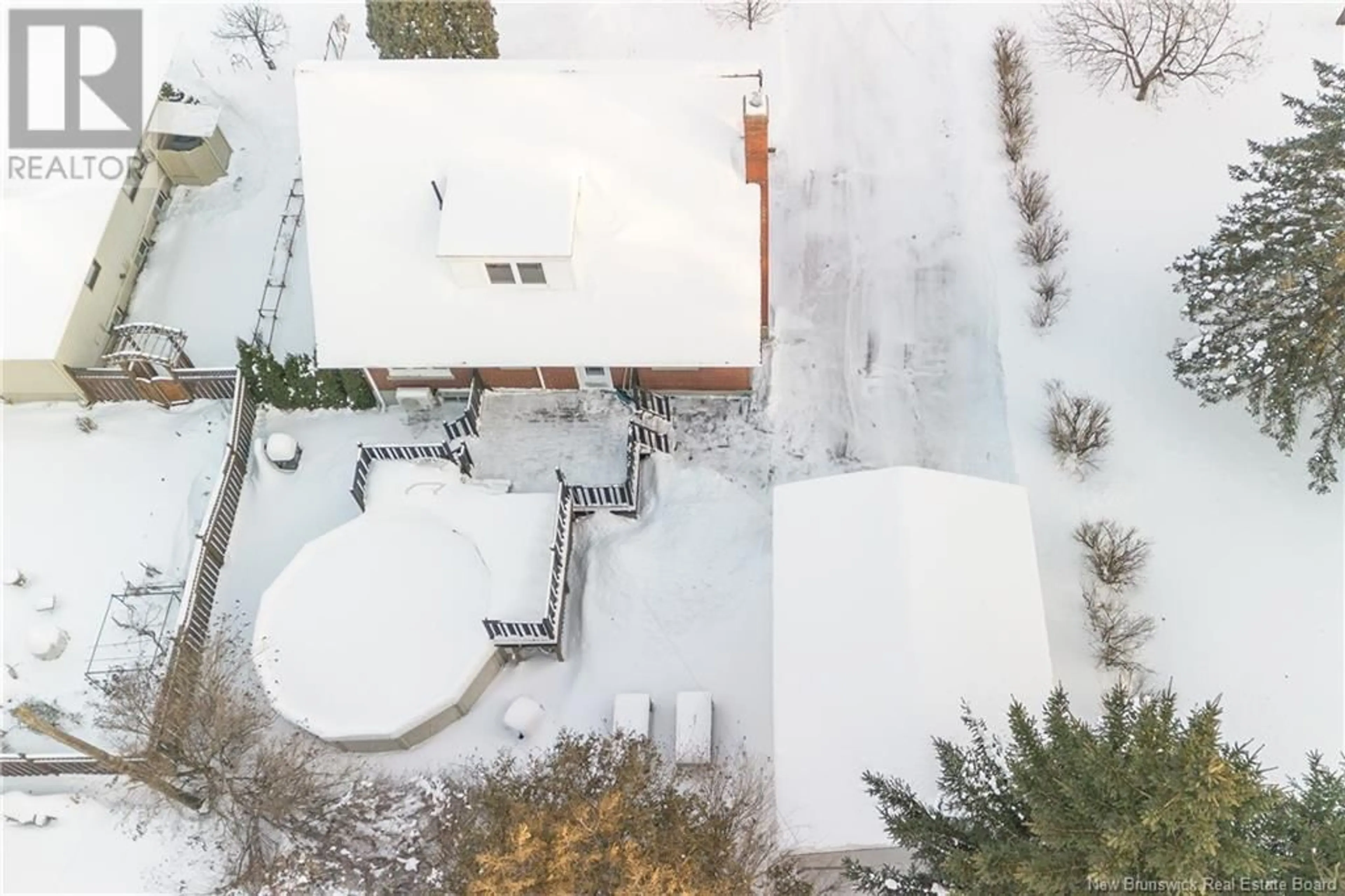 A pic from outside/outdoor area/front of a property/back of a property/a pic from drone, street for 70 ORDONNANCE AVENUE, Edmundston New Brunswick E3V1C5