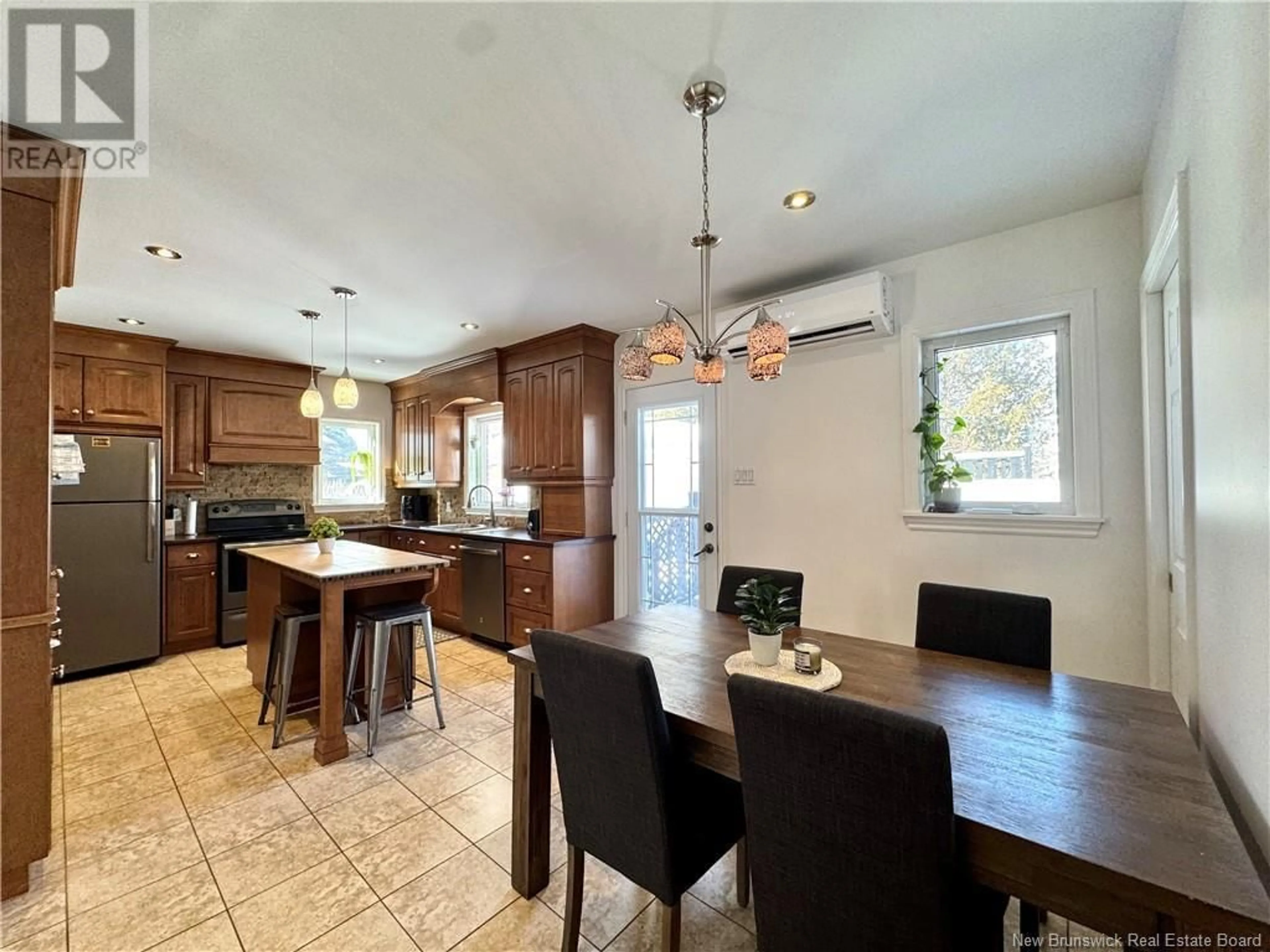 Open concept kitchen, ceramic/tile floor for 70 ORDONNANCE AVENUE, Edmundston New Brunswick E3V1C5