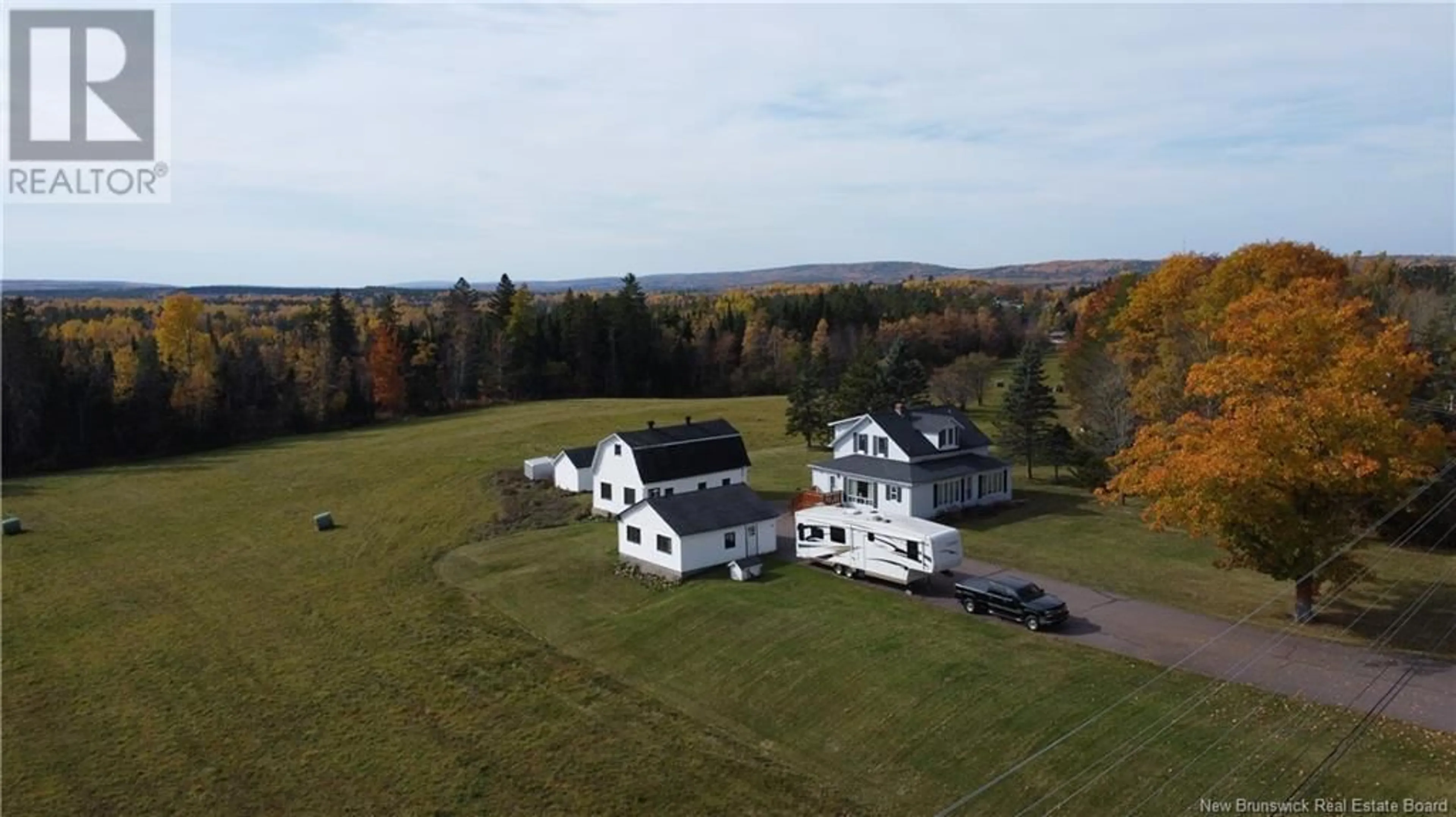 A pic from outside/outdoor area/front of a property/back of a property/a pic from drone, unknown for 83 Pollett River Road, Petitcodiac New Brunswick E4Z4J4